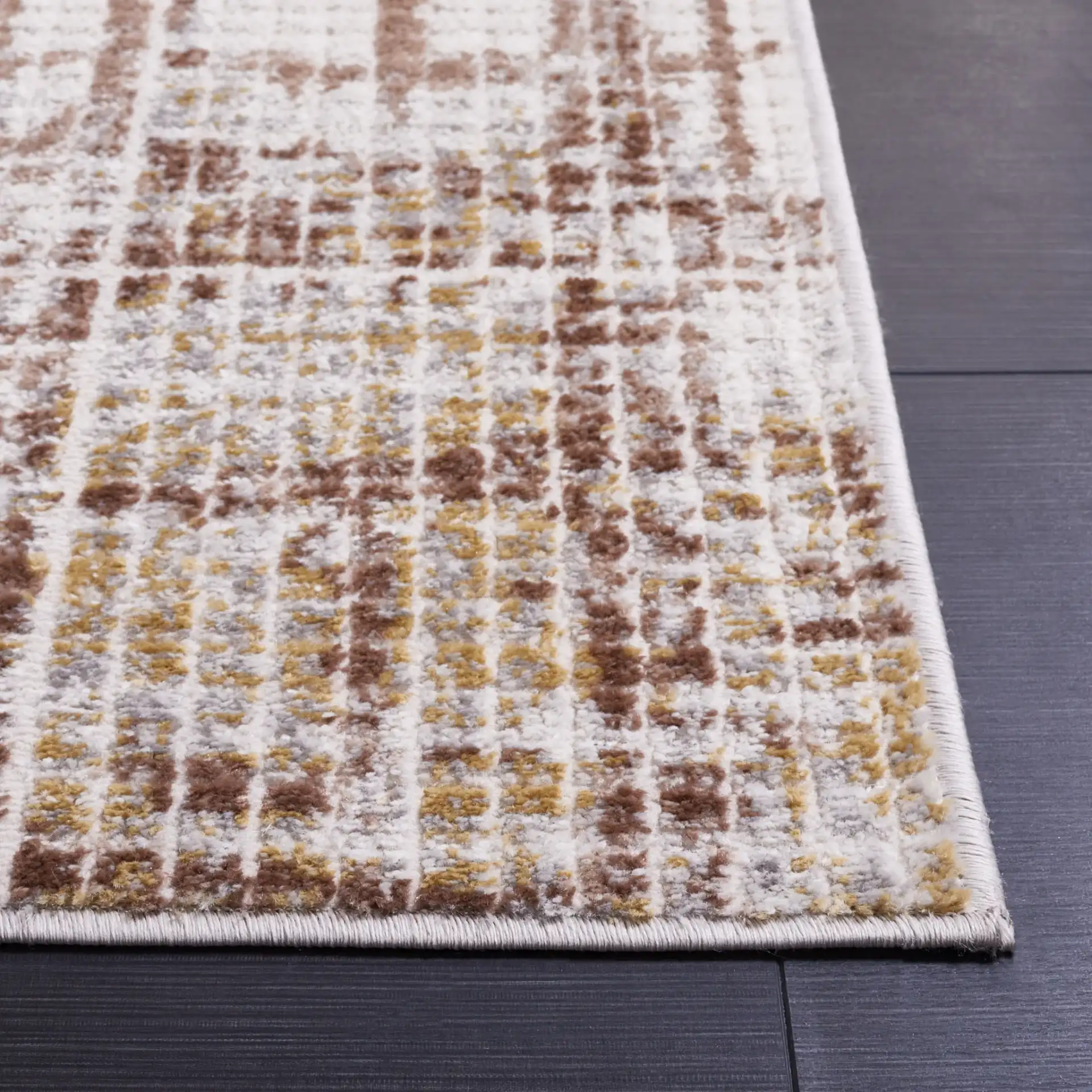 Palma Textured Grid Rug in Beige / Brown in a styled room