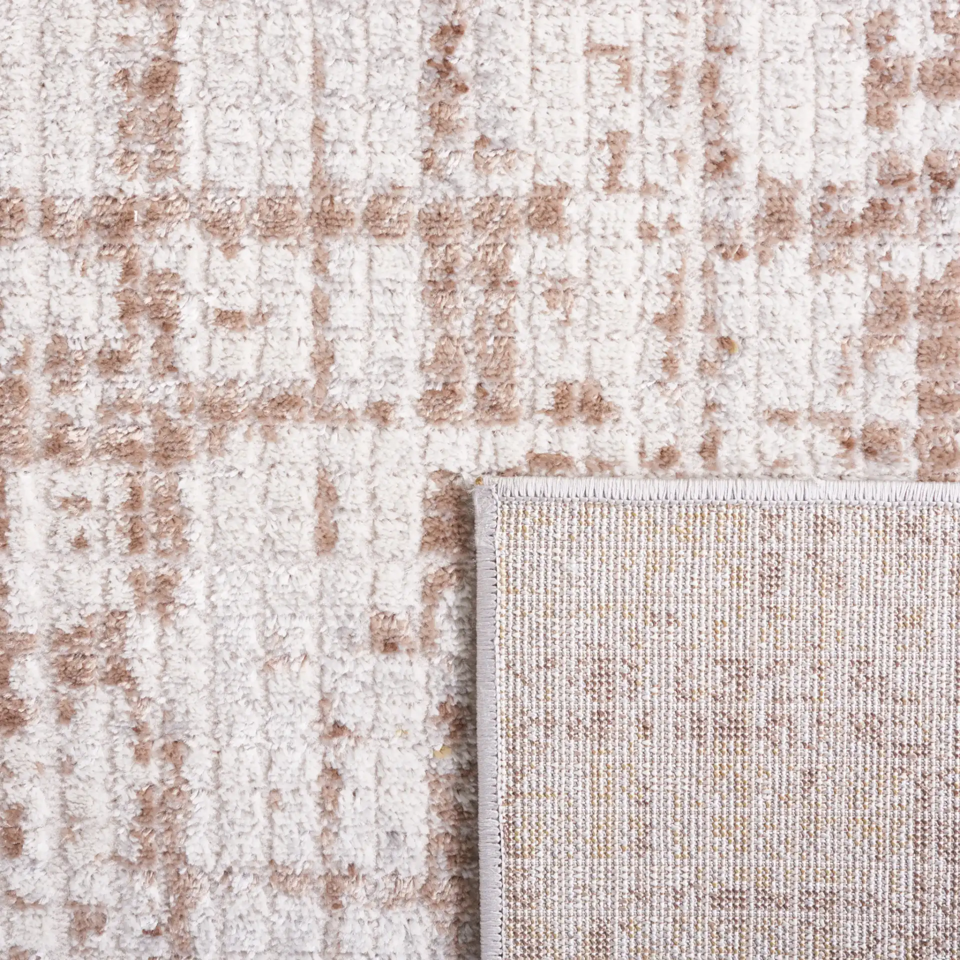 Palma Textured Grid Rug in Beige / Brown in a styled room