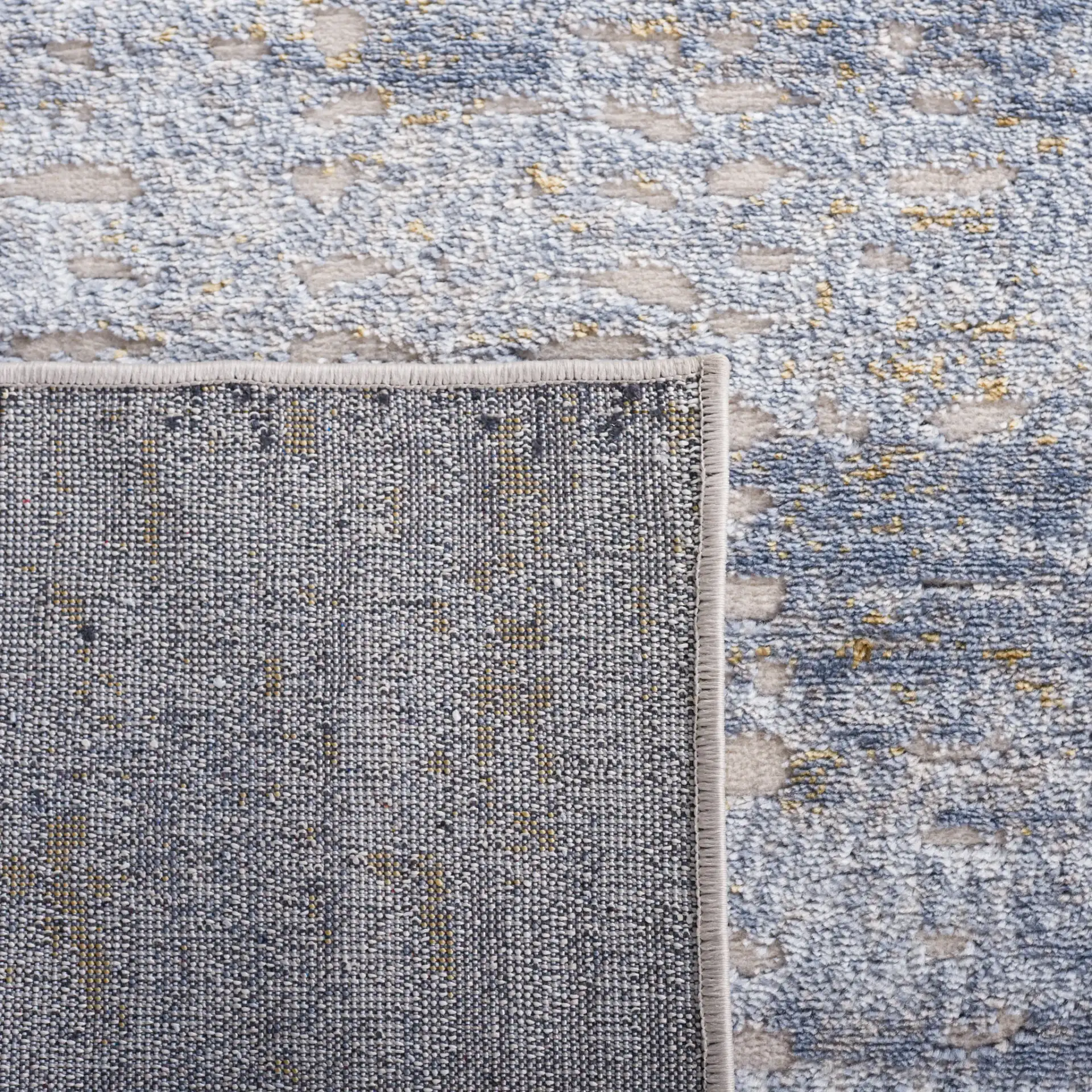 Palma Abstract Panel Rug in Beige / Light Blue in a styled room
