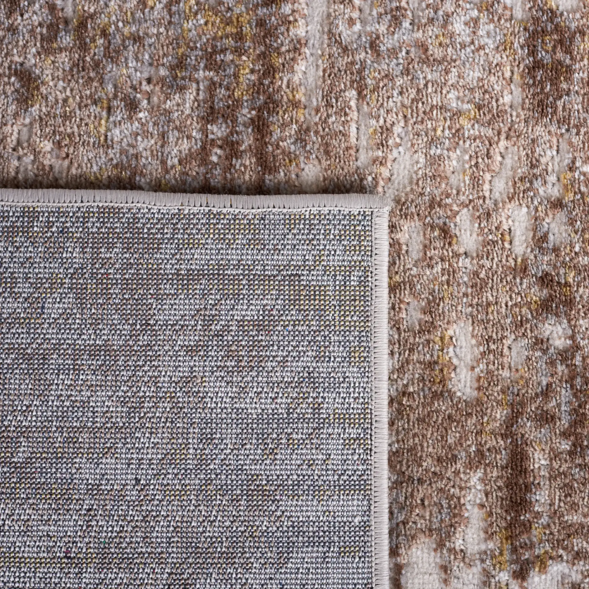 Palma Abstract Panel Rug in Beige / Brown in a styled room