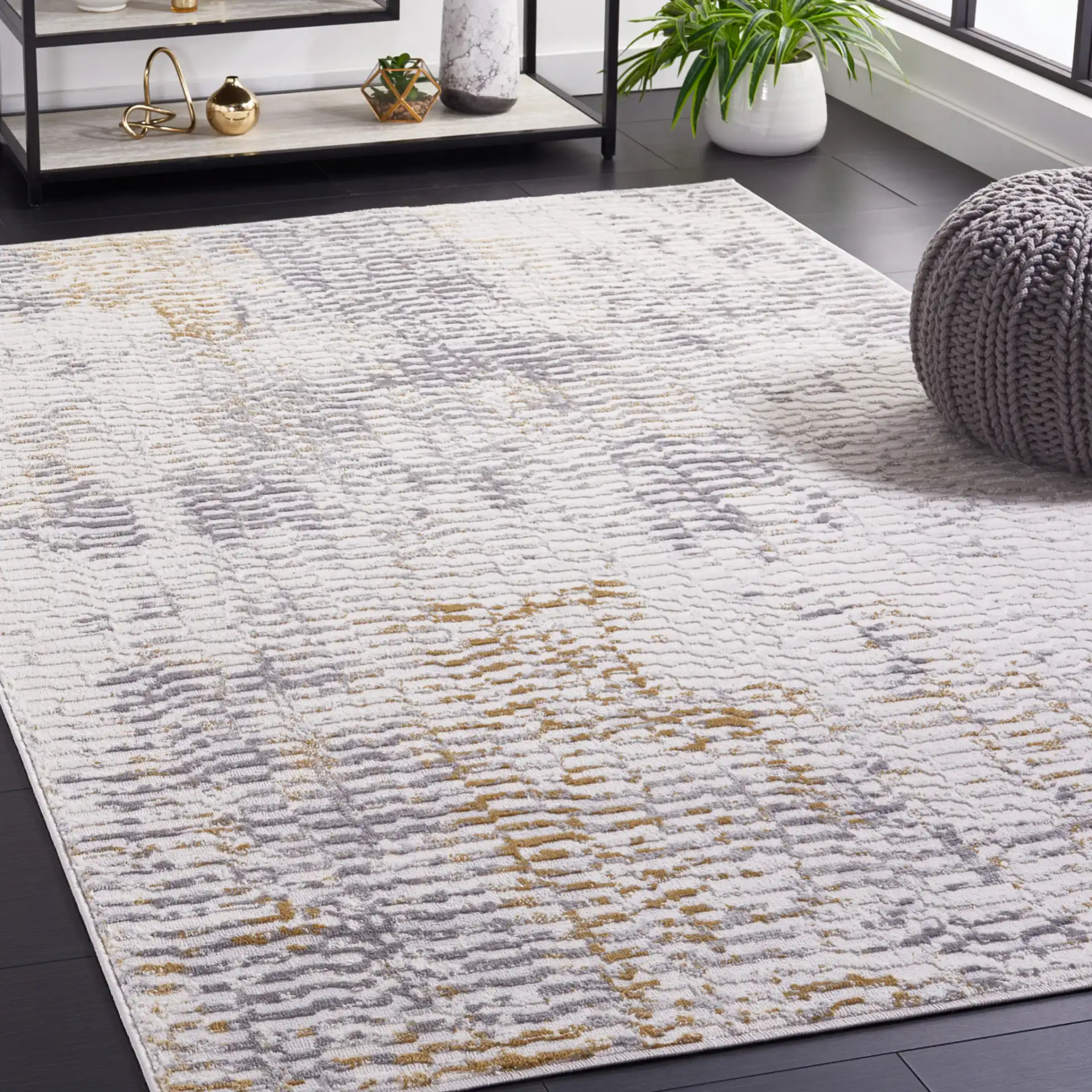 Palma Faded Abstract Rug in Beige / Light Gray in a styled room