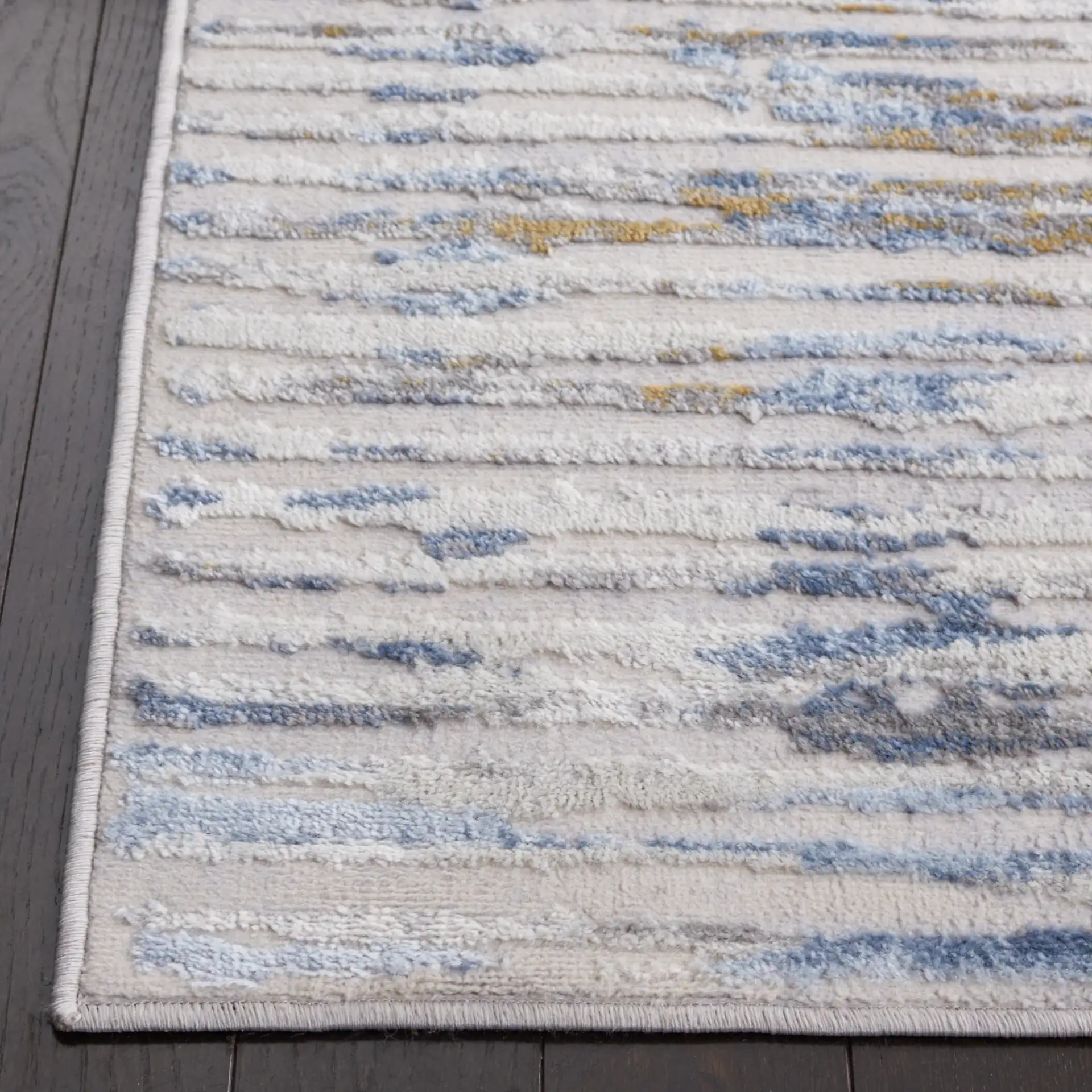 Palma Linear Stripe Rug in Gray / Blue in a styled room