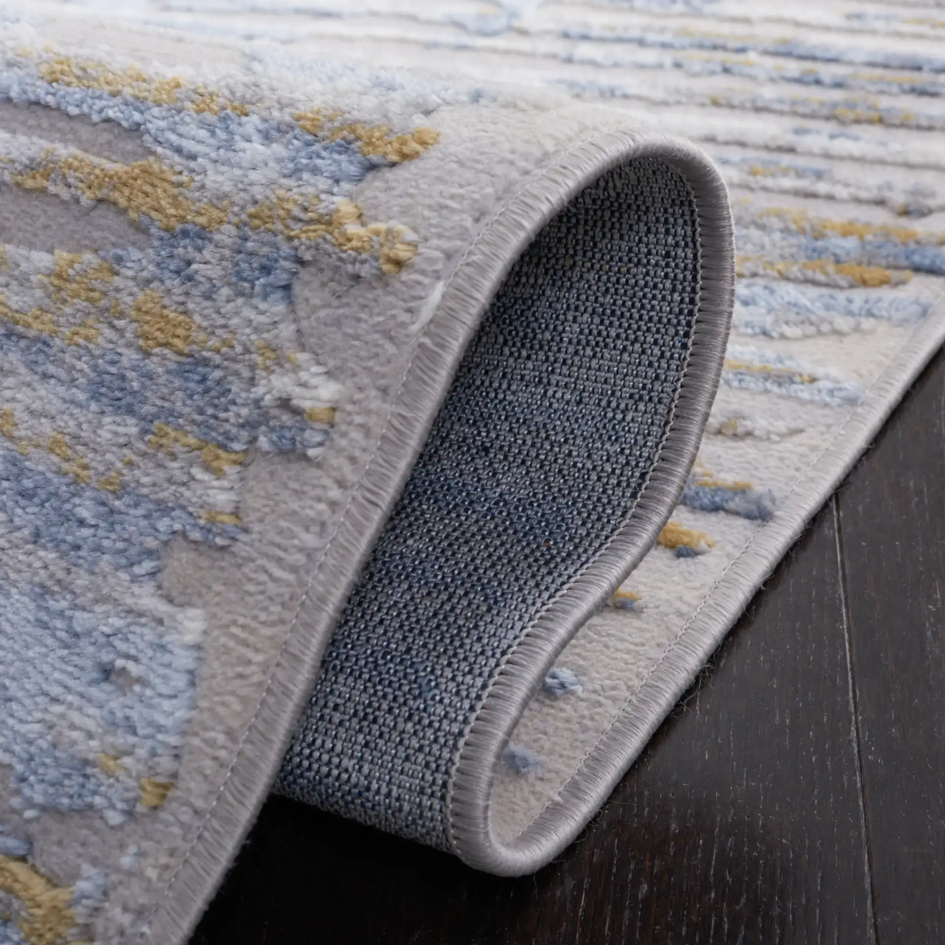 Palma Linear Stripe Rug in Gray / Blue in a styled room