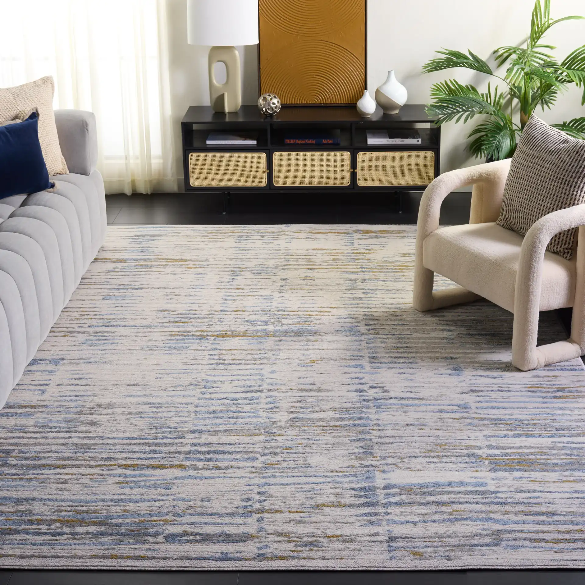 Palma Linear Stripe Rug in Gray / Blue in a styled room