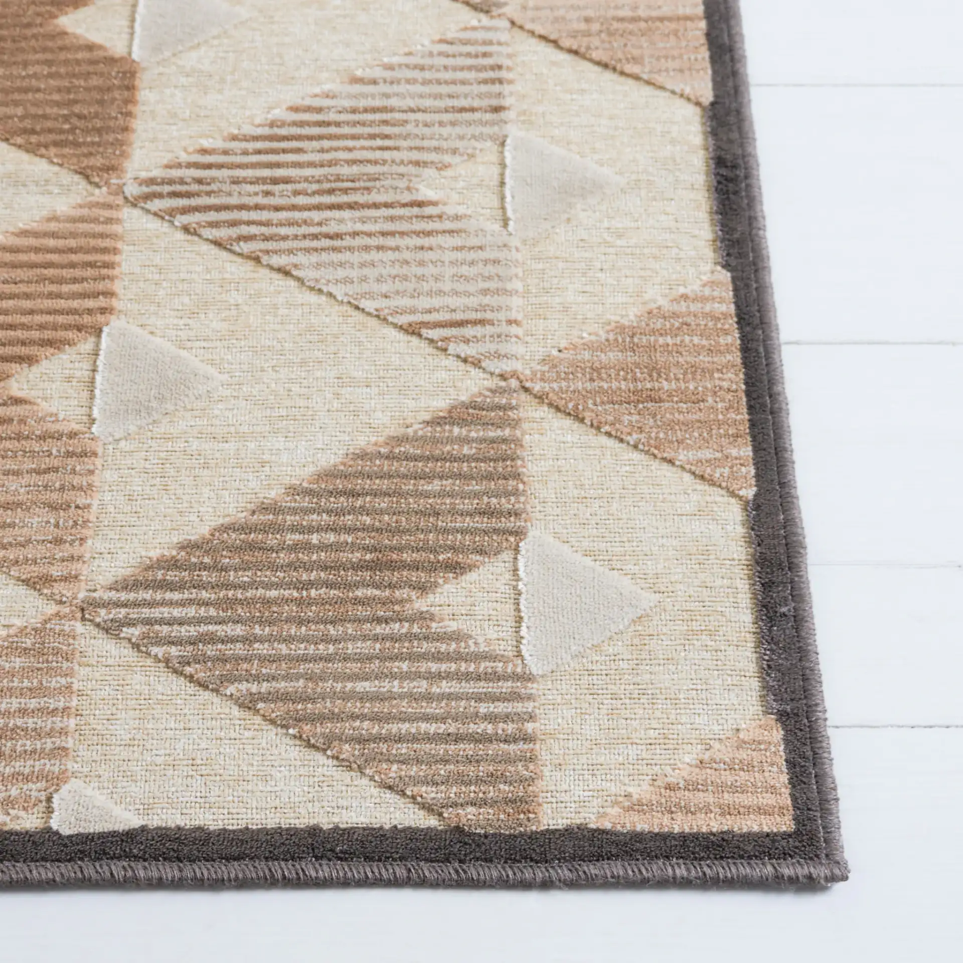 Paradise Triangle Chevron Rug in Soft Anthracite / Cream in a styled room