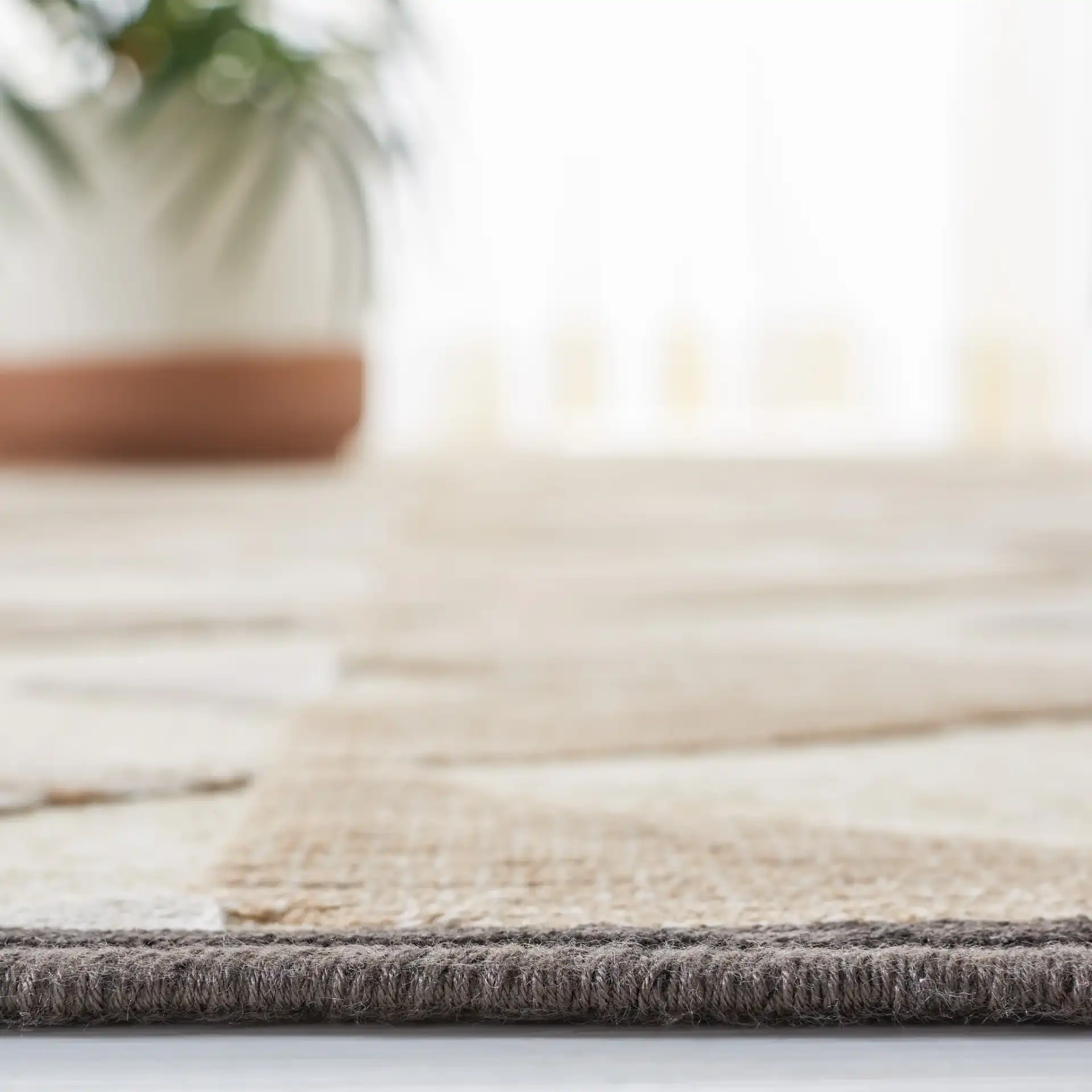 Paradise Triangle Chevron Rug in Soft Anthracite / Cream in a styled room