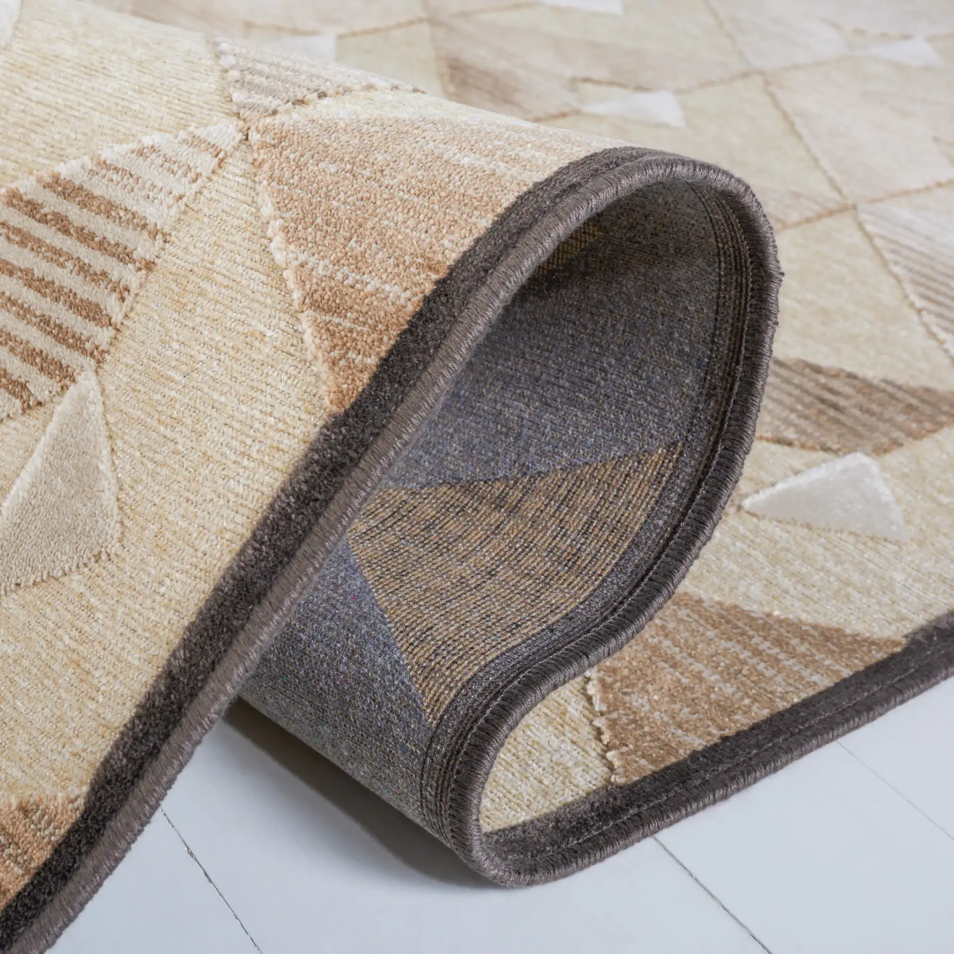 Paradise Triangle Chevron Rug in Soft Anthracite / Cream in a styled room