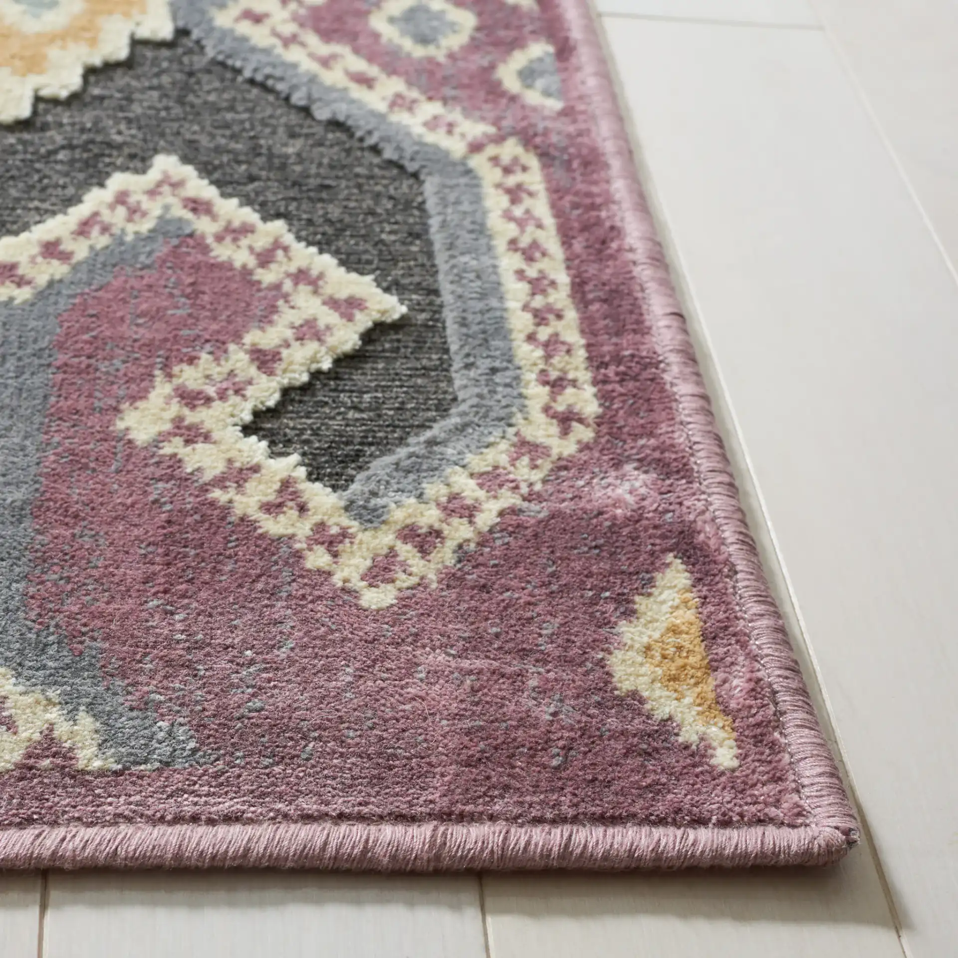 Paradise Thom Felica Stepped Diamond Rug in Purple / Multicolor in a styled room