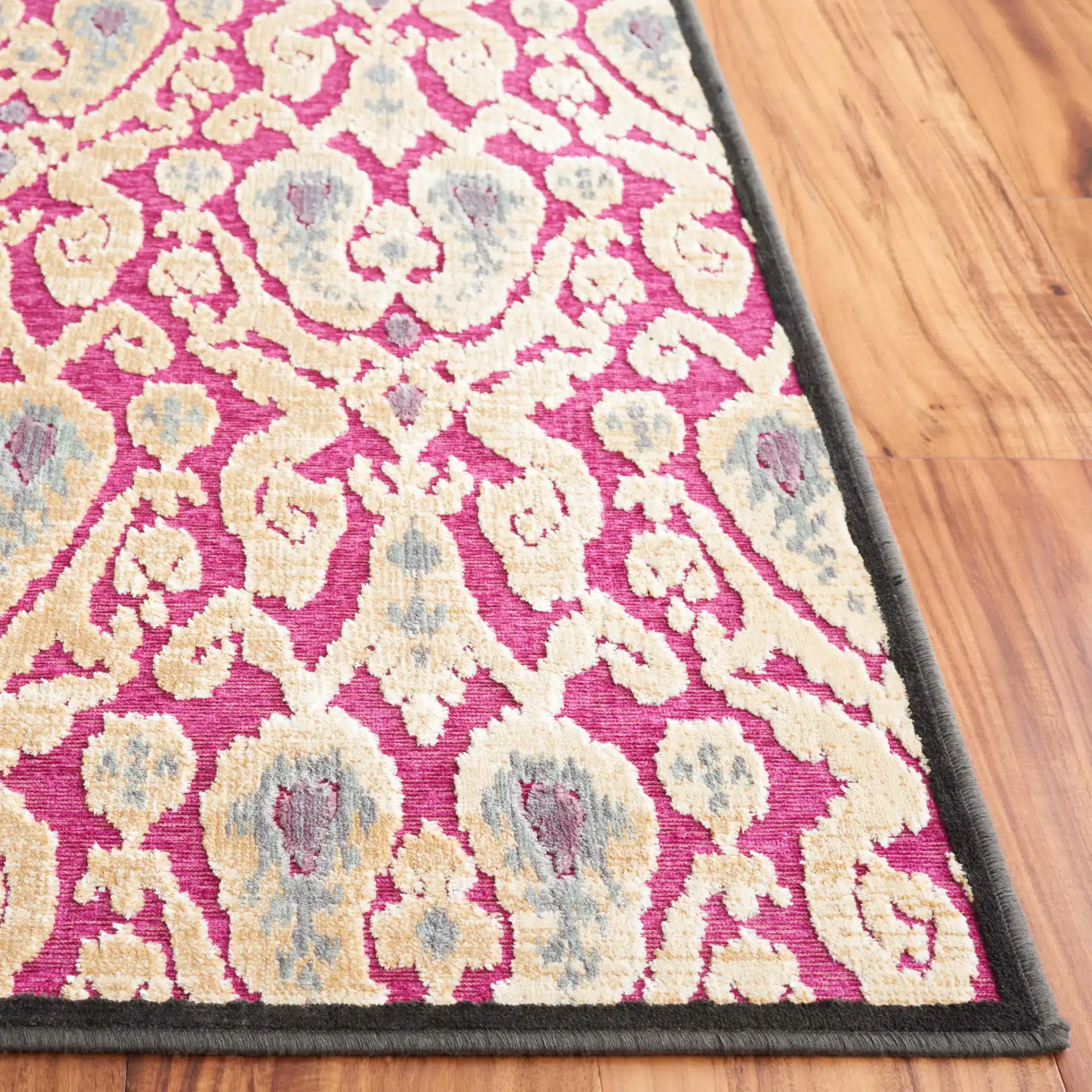 Paradise David Easton Ikat Rug in Anthracite / Fuchsia in a styled room