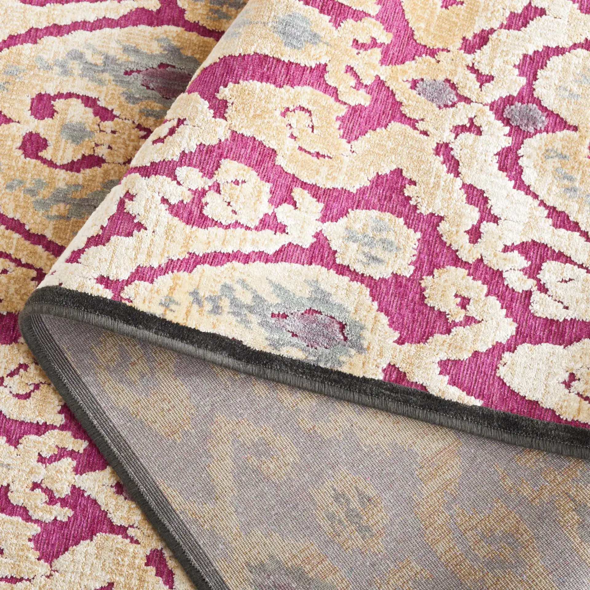 Paradise David Easton Ikat Rug in Anthracite / Fuchsia in a styled room