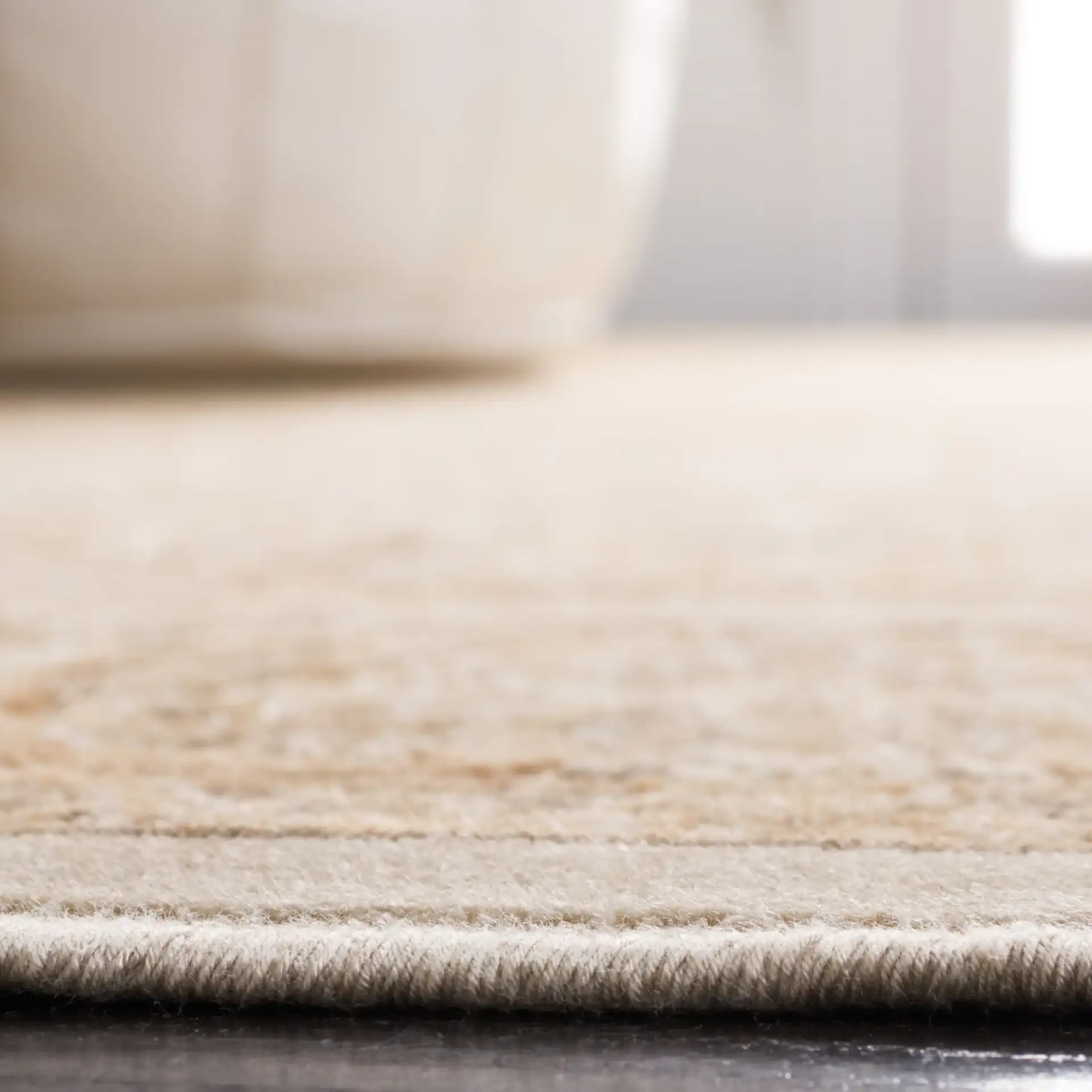 Paradise Medallion Border Rug in Stone / Cream in a styled room