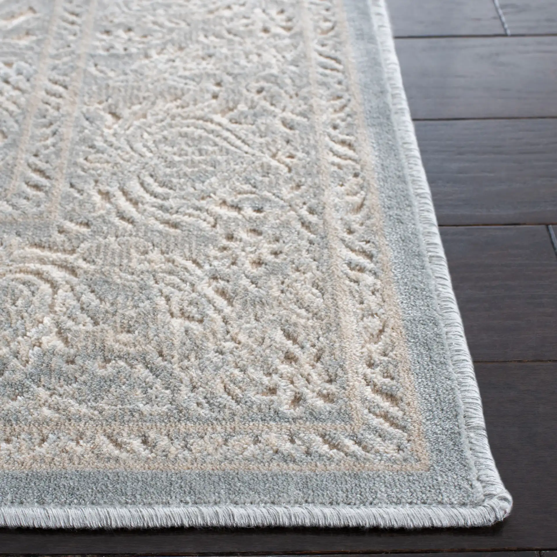 Paradise Damask Bordered Rug in Cream / Slate Blue in a styled room