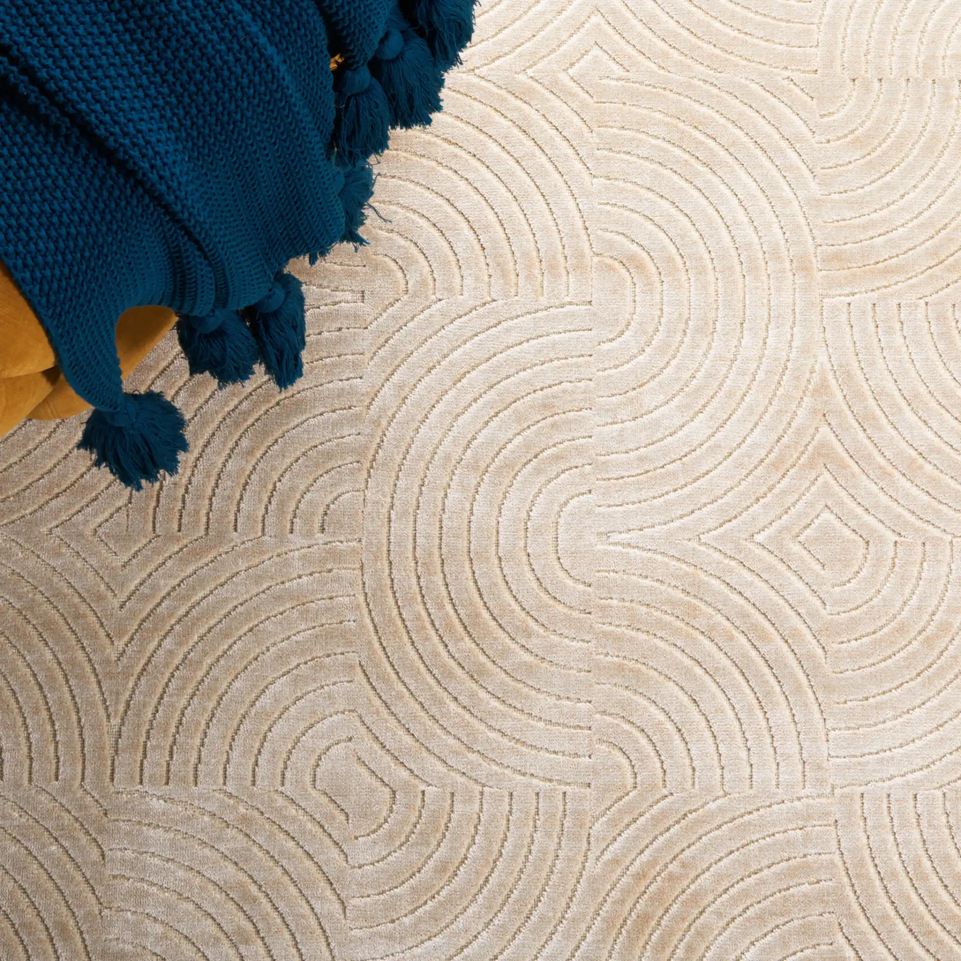 Paradise Concentric Arc Rug in Stone in a styled room