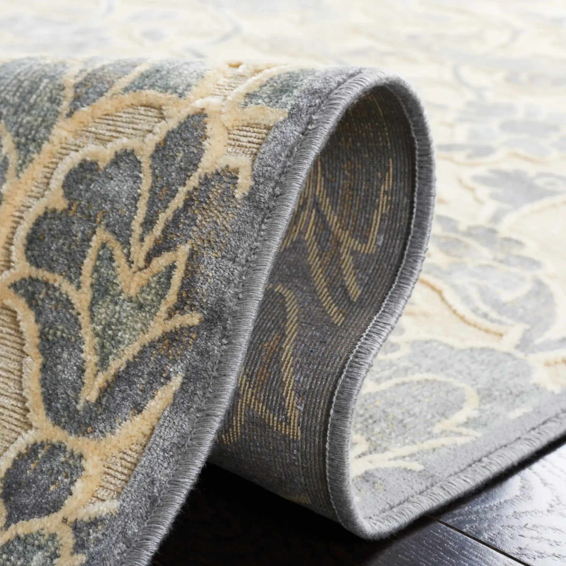Paradise Damask Rug in Cream / Slate in a styled room