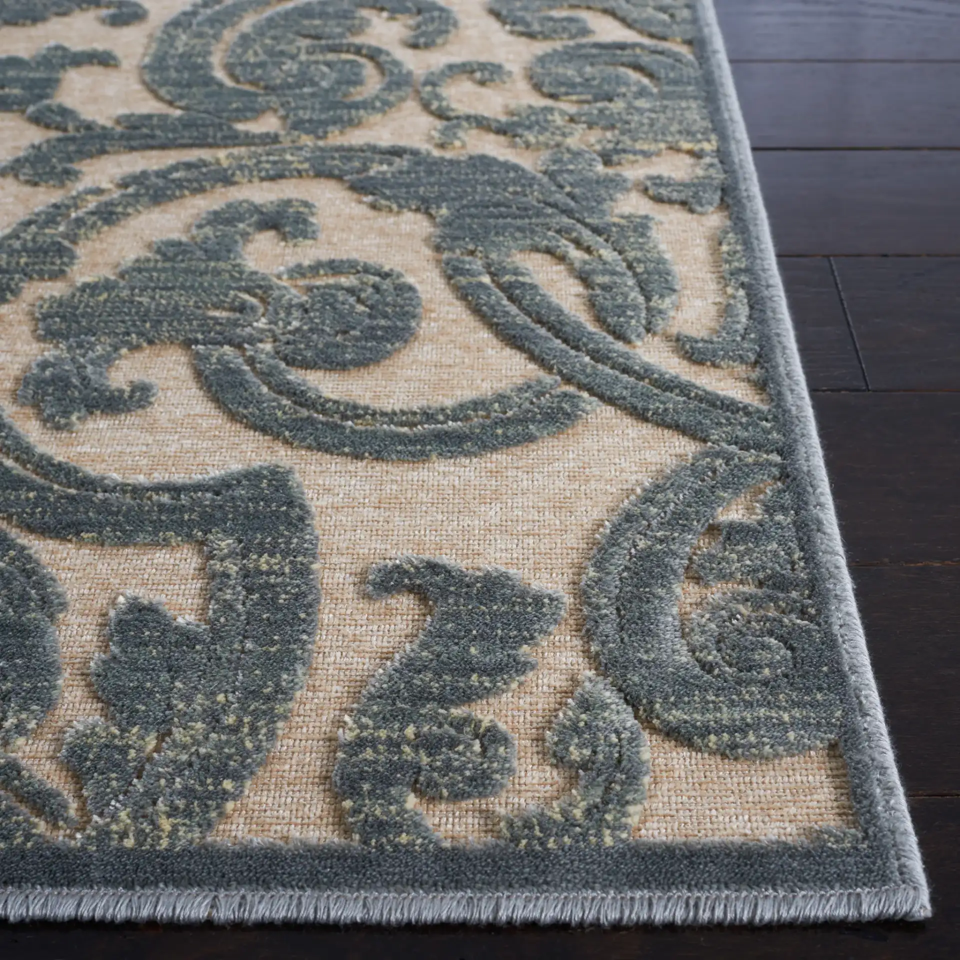 Paradise Isaac Mizrahi Damask Rug in Gray / Multicolor in a styled room