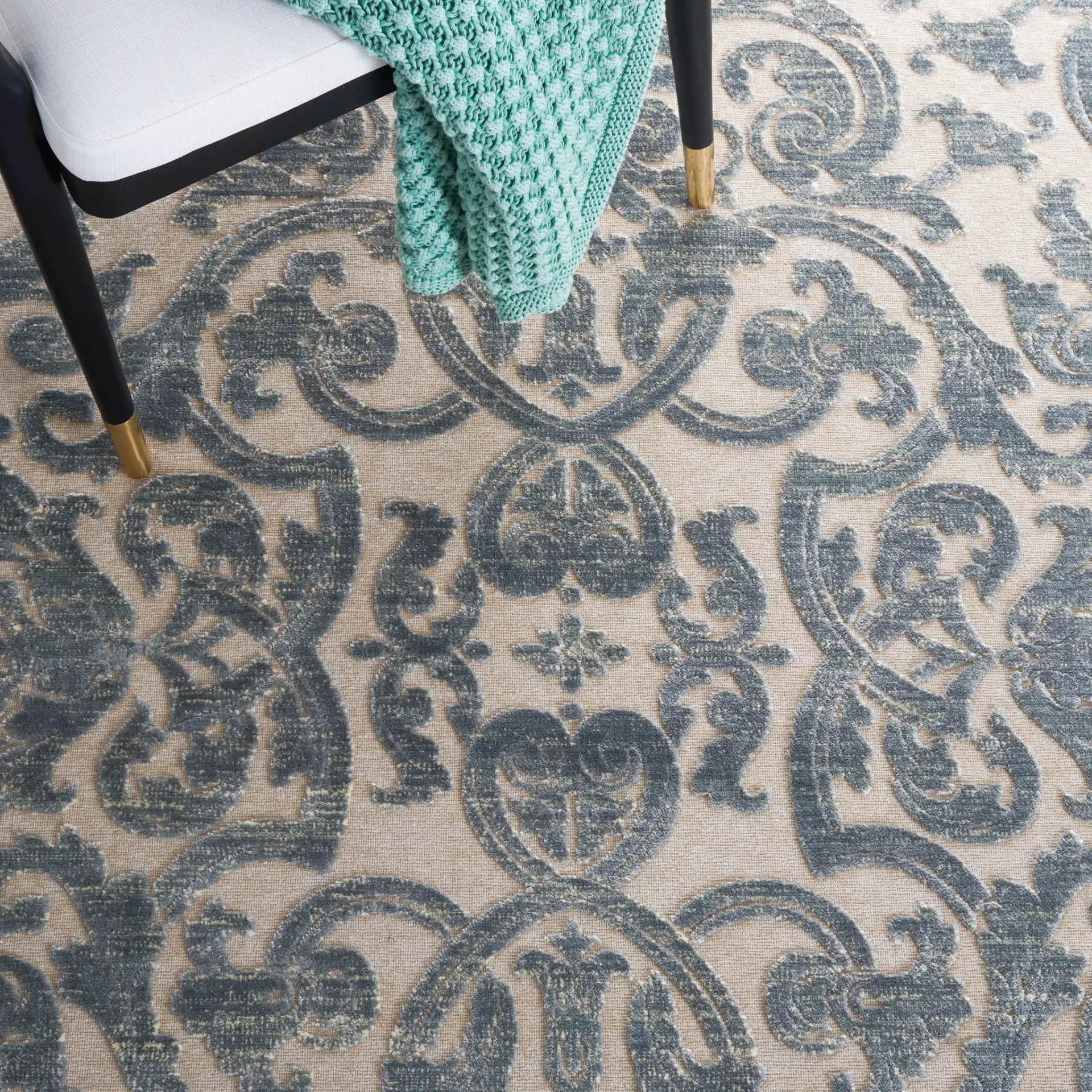 Paradise Isaac Mizrahi Damask Rug in Gray / Multicolor in a styled room