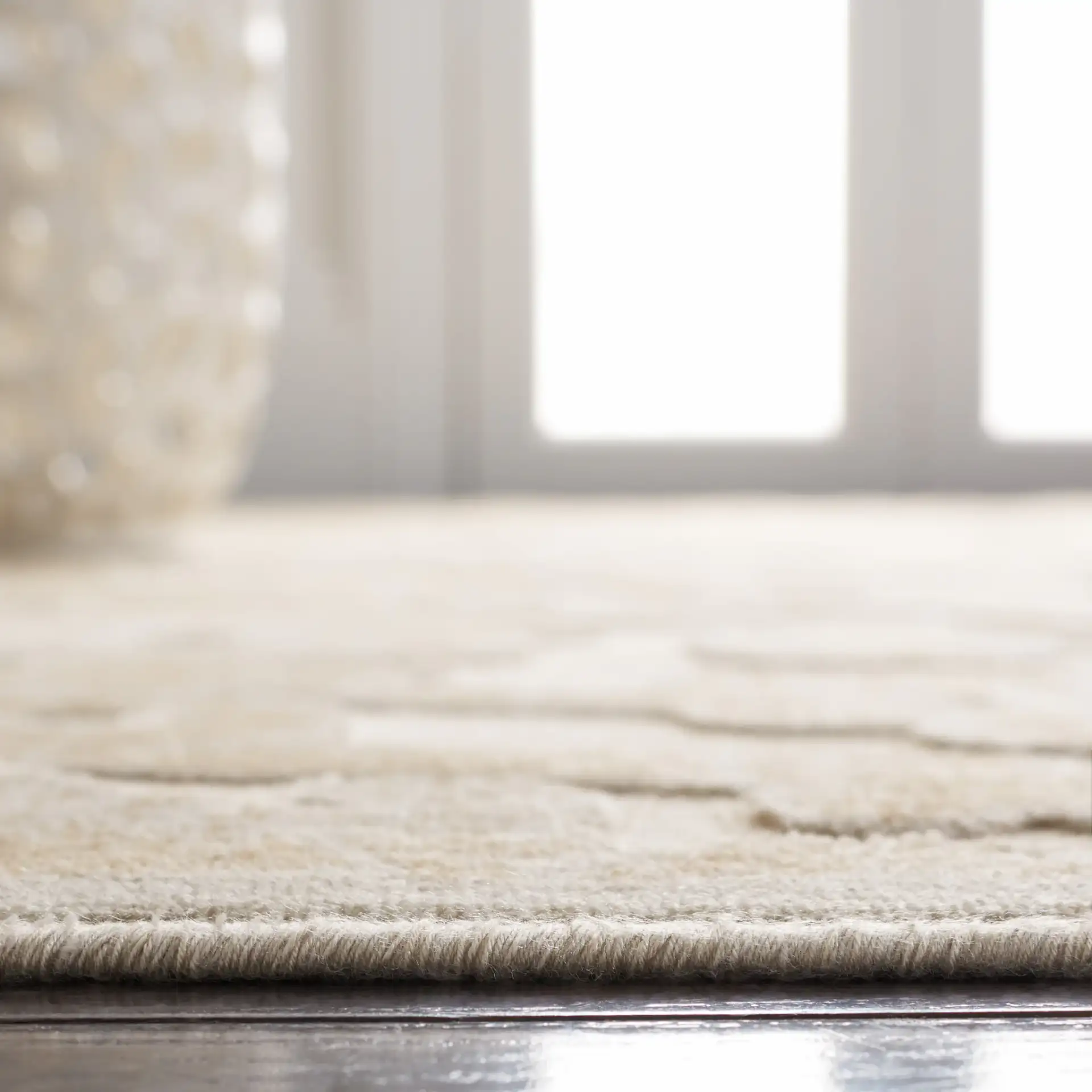 Paradise Scrolling Vine Viscose Rug in Stone / Cream in a styled room