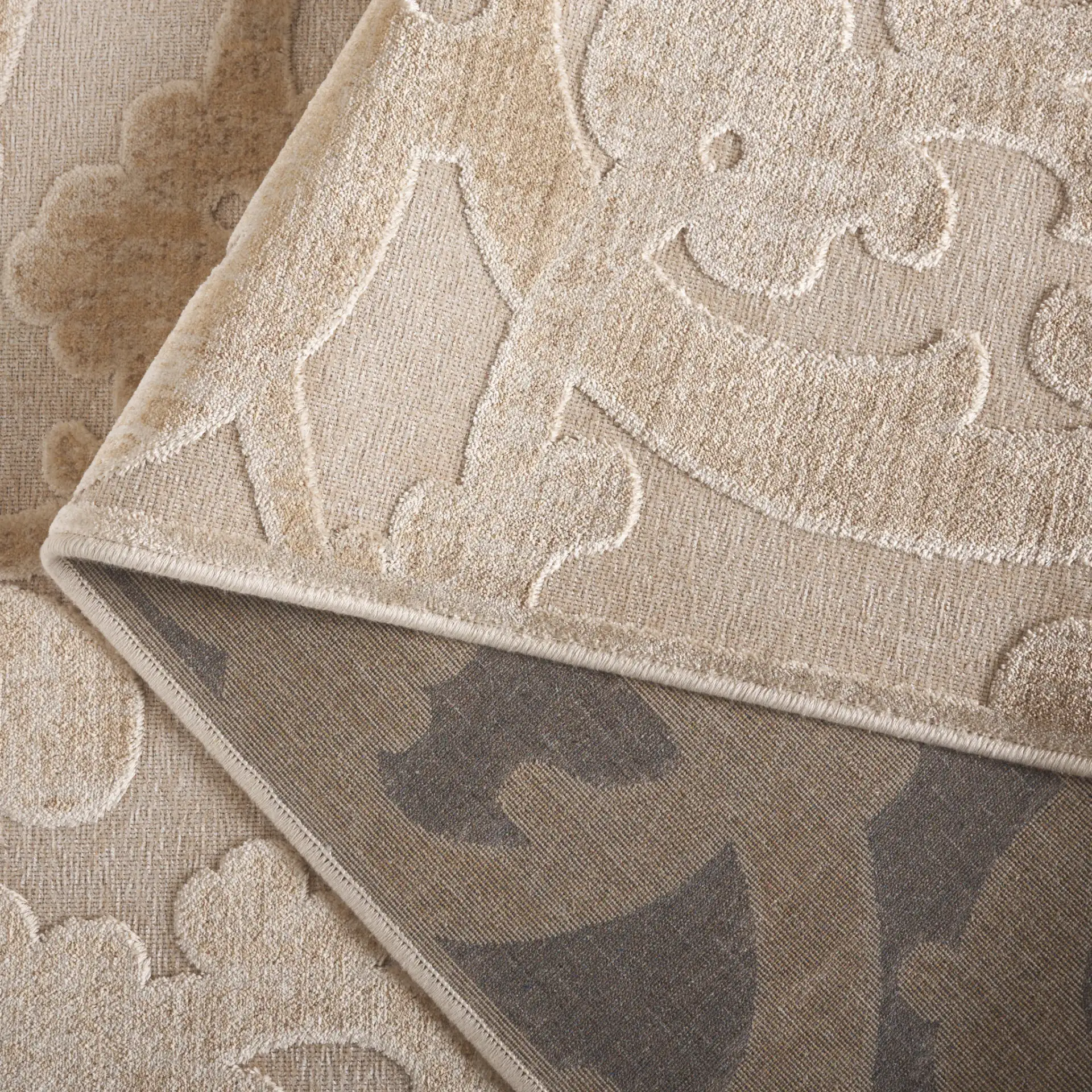 Paradise Scrolling Vine Viscose Rug in Stone / Cream in a styled room