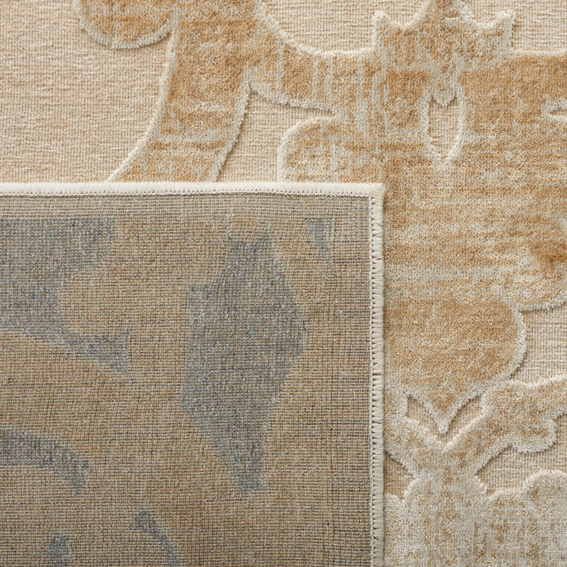 Paradise Scrolling Vine Viscose Rug in Stone / Cream in a styled room