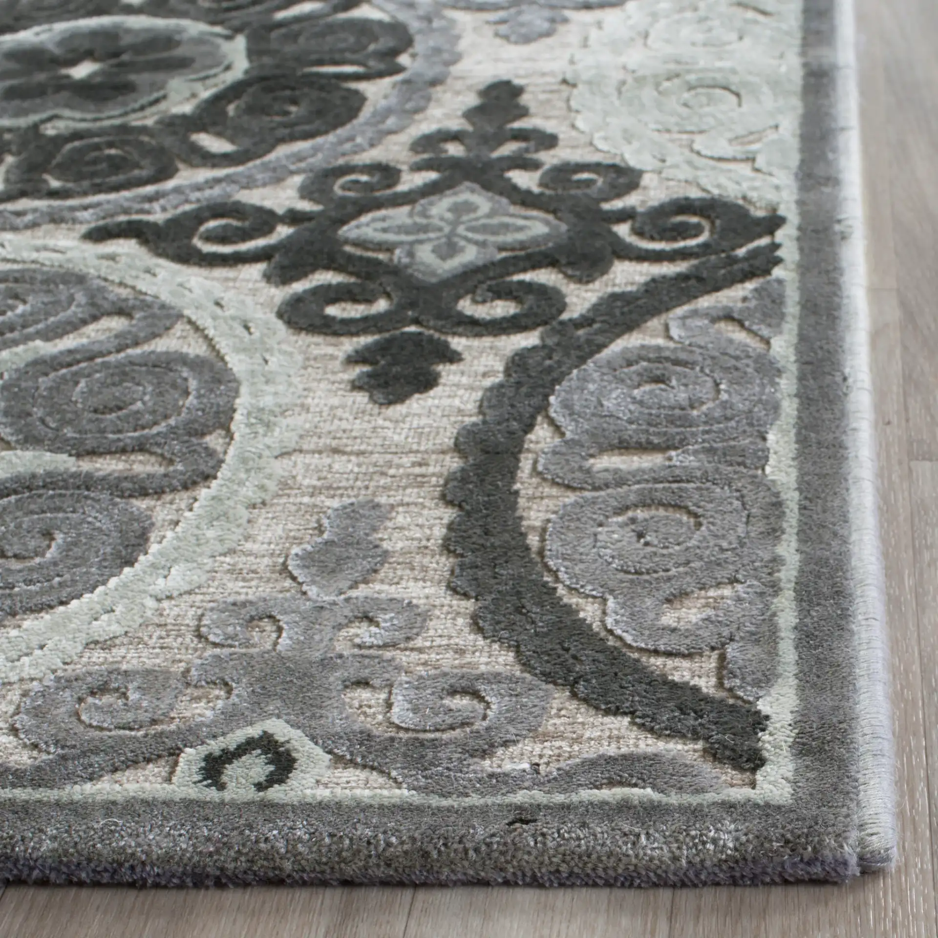 Paradise Circular Medallion Rug in Light Gray / Dark Gray in a styled room