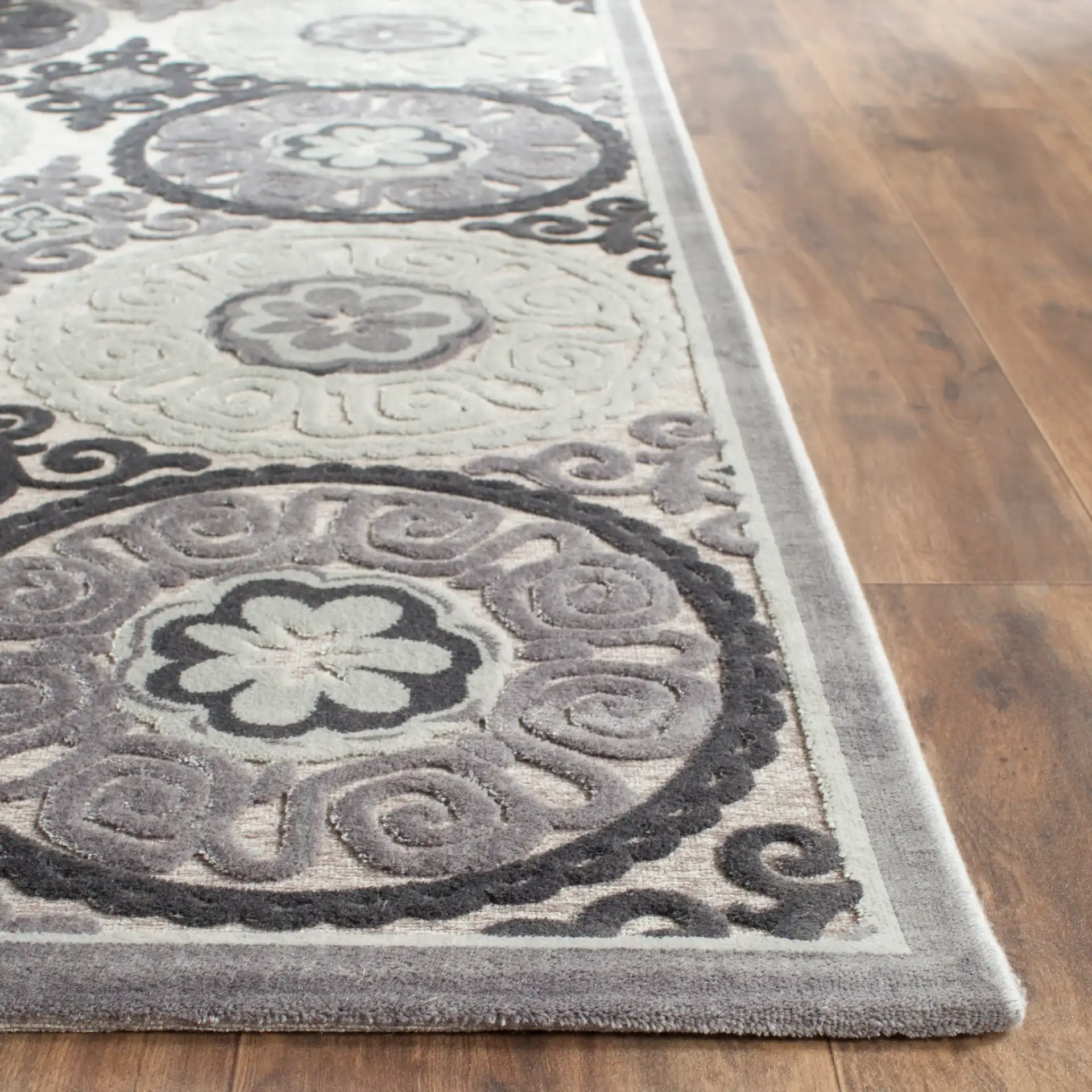 Paradise Circular Medallion Rug in Light Gray / Dark Gray in a styled room
