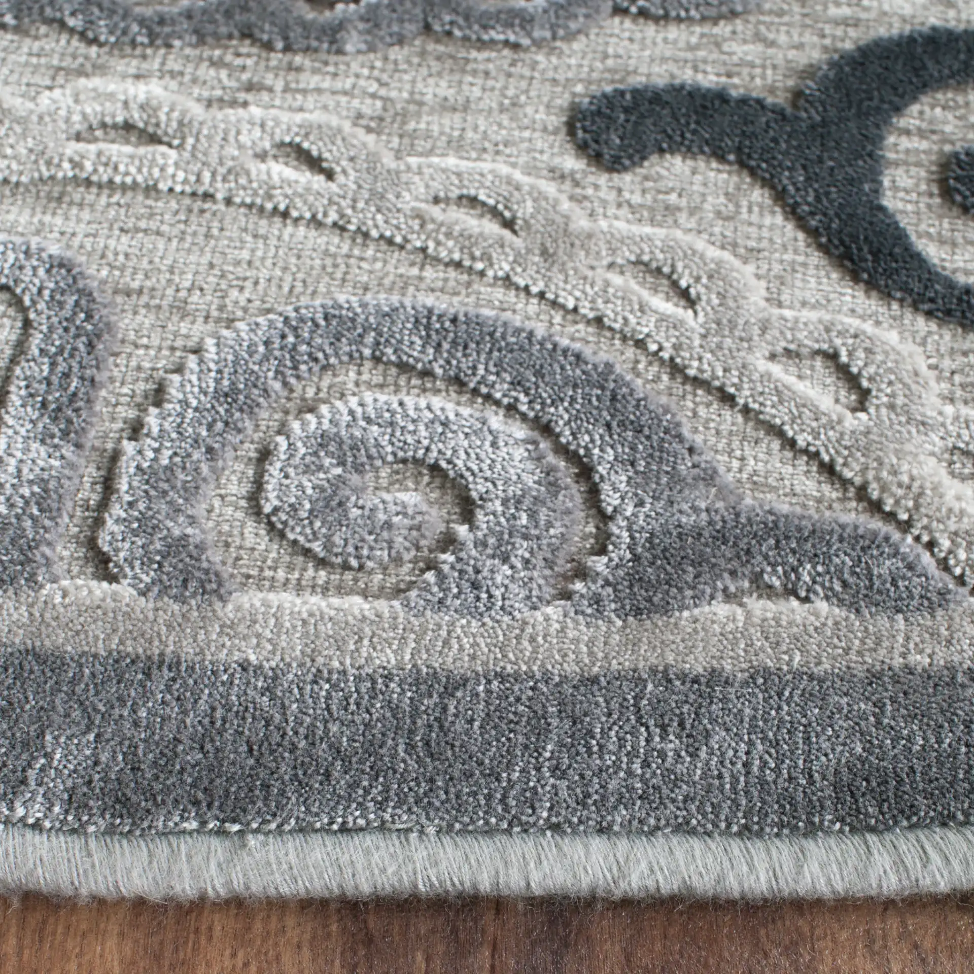 Paradise Circular Medallion Rug in Light Gray / Dark Gray in a styled room