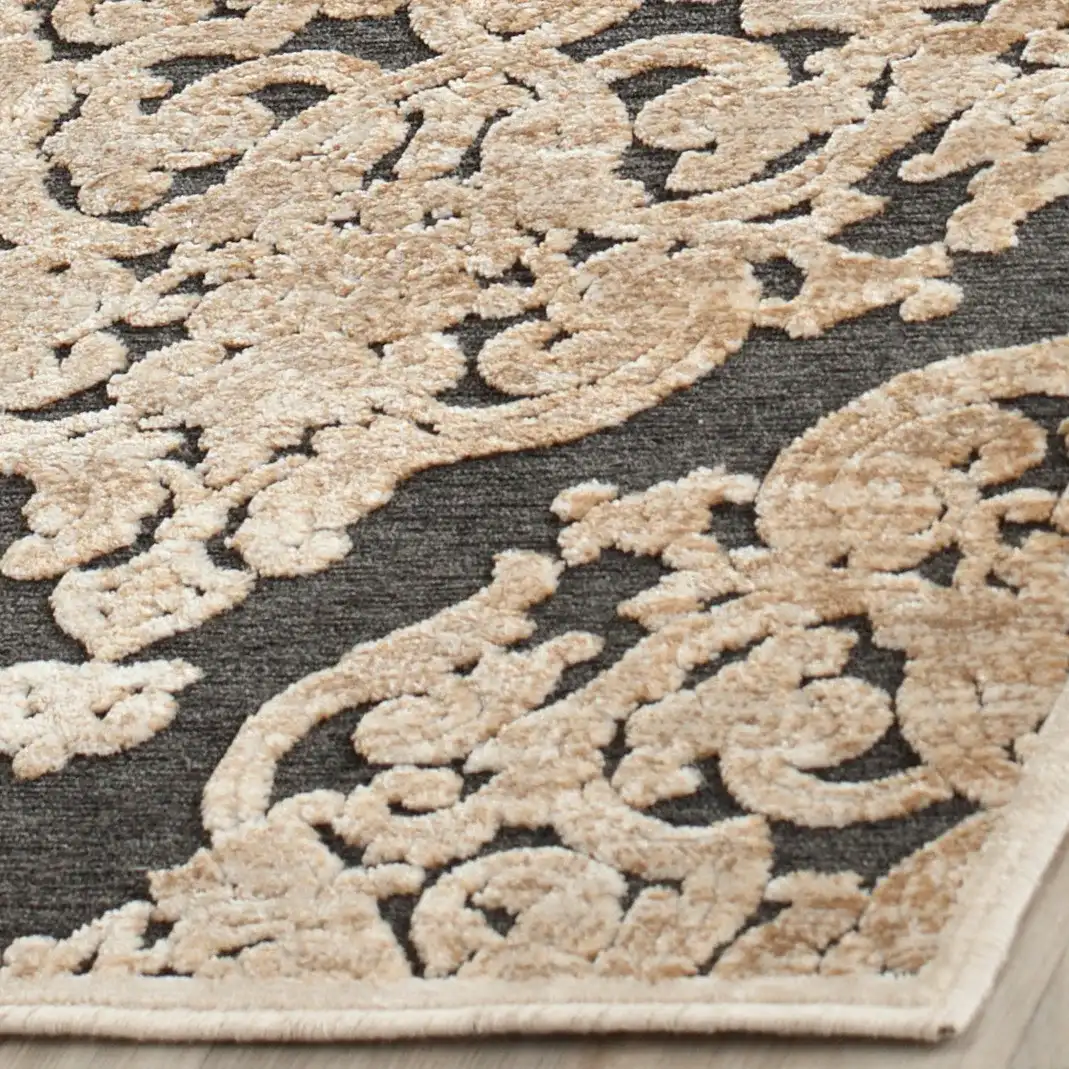 Paradise Large-Scale Damask Rug in Stone / Anthracite in a styled room