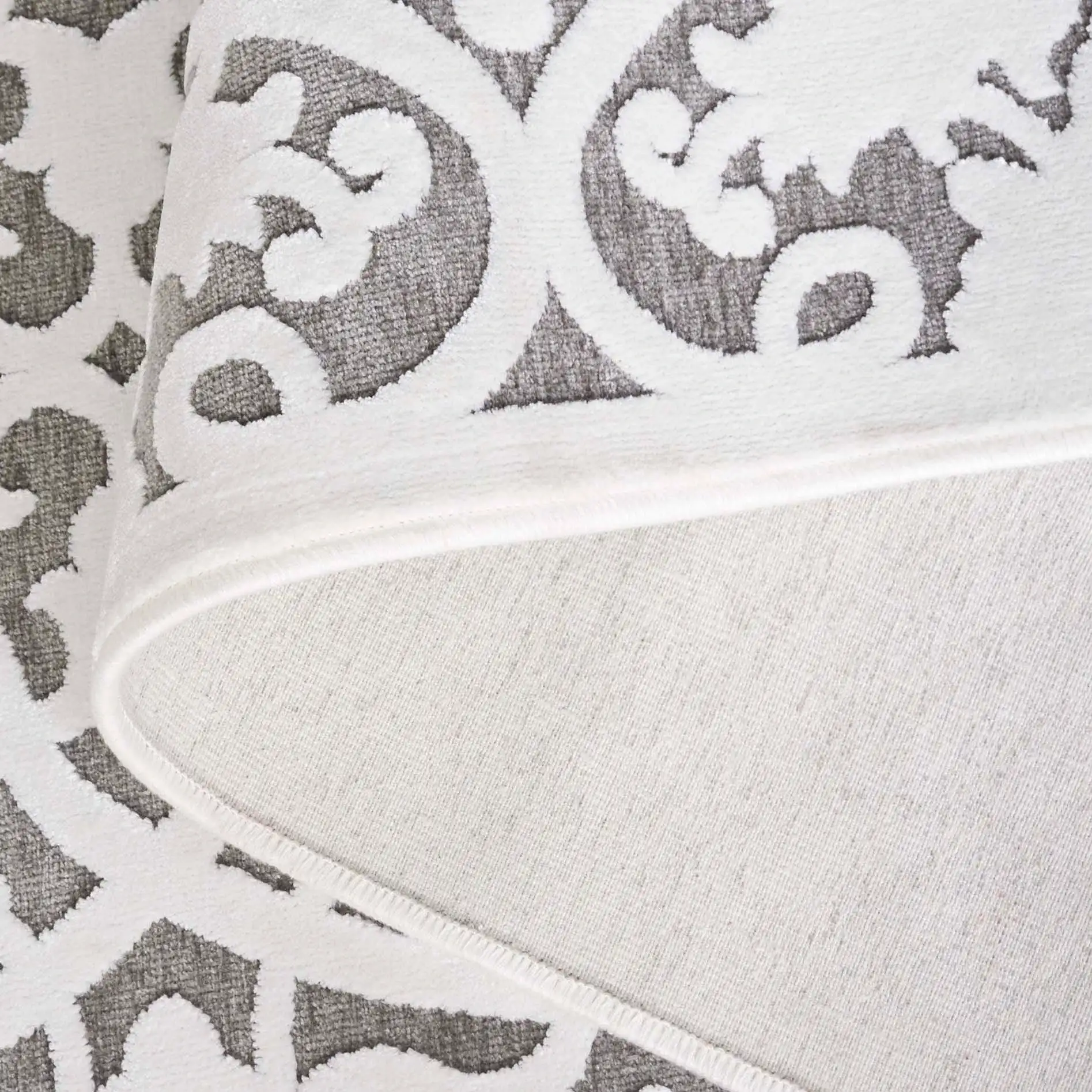 Paradise Interlocking Vine Rug in Ivory / Dark Gray in a styled room