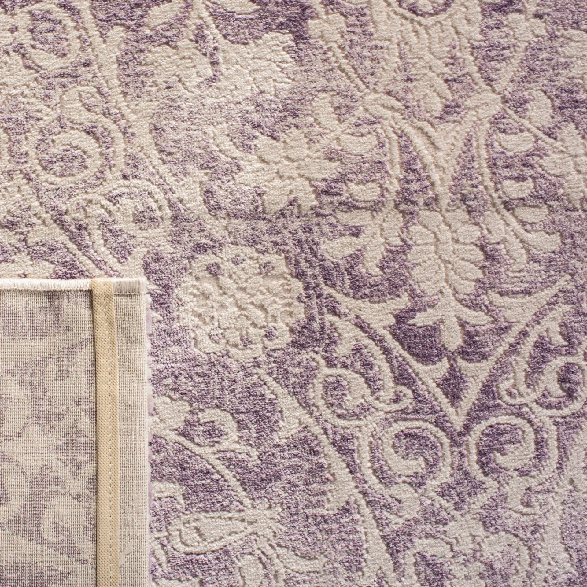 Passion Distressed Damask Rug in Lavender / Ivory in a styled room