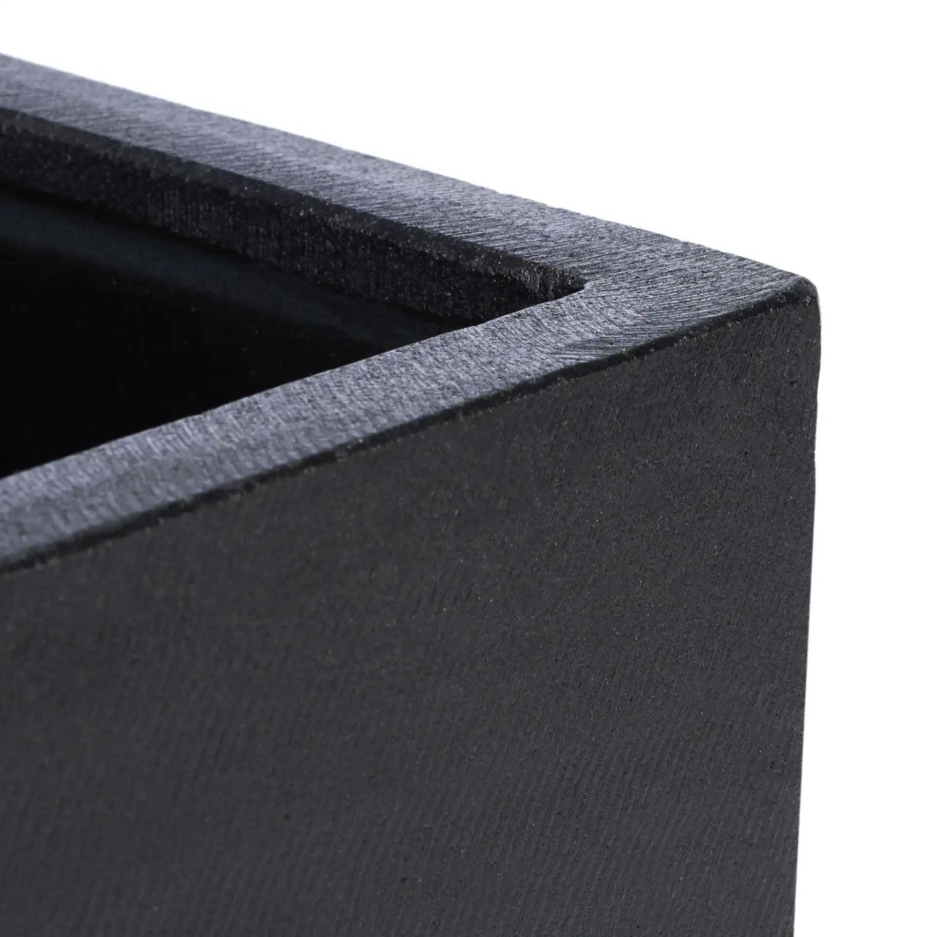 Borsla Planter in Black in a styled room