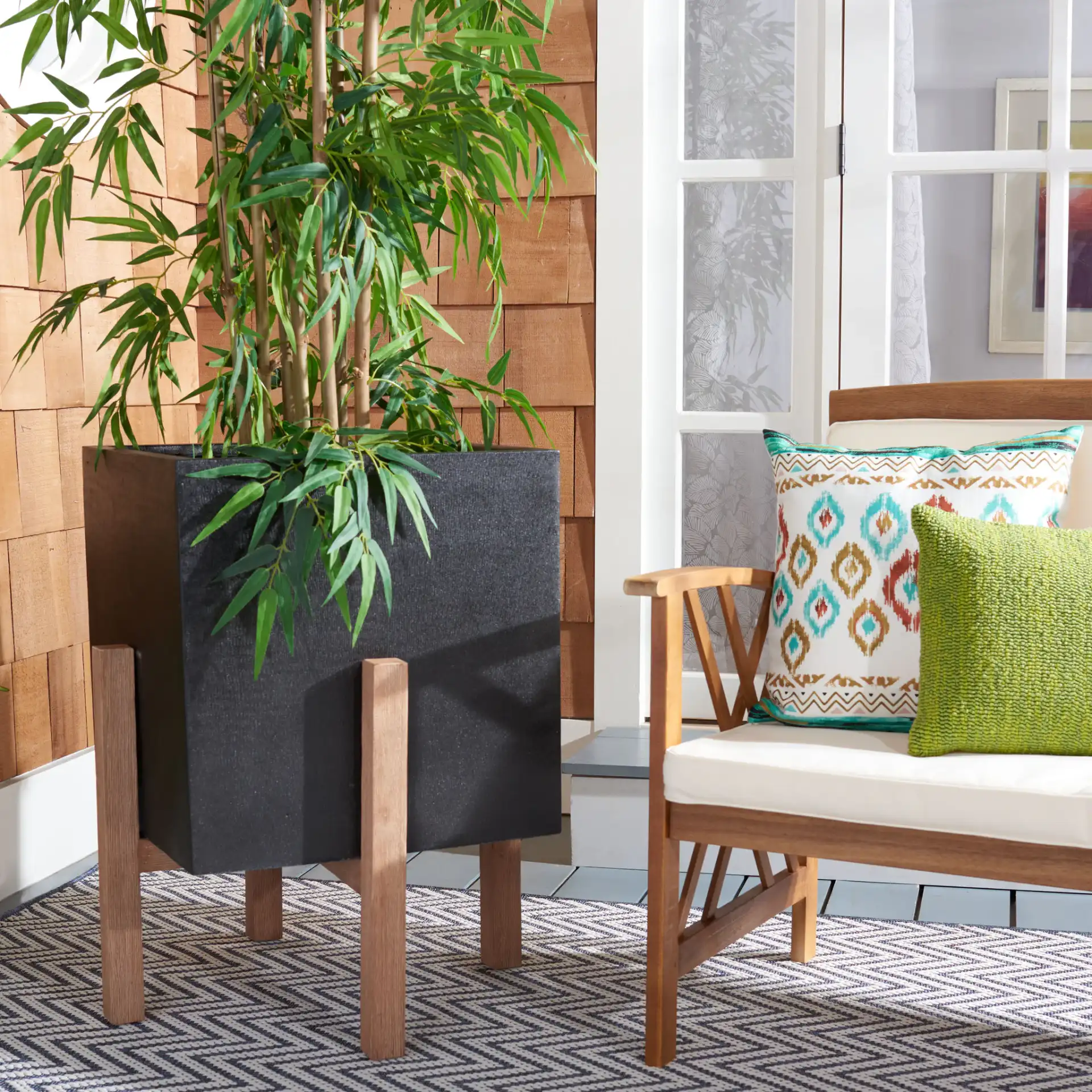 Borsla Large Planter in Black in a styled room