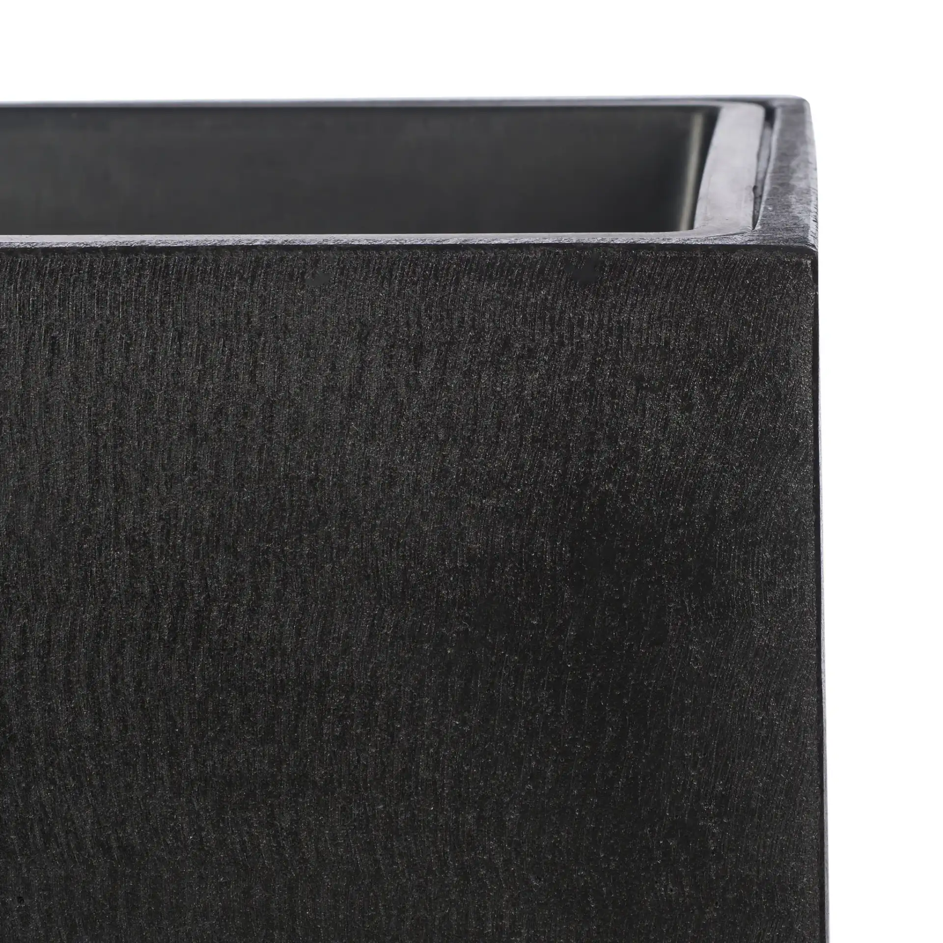 Kendri Planter in Black in a styled room