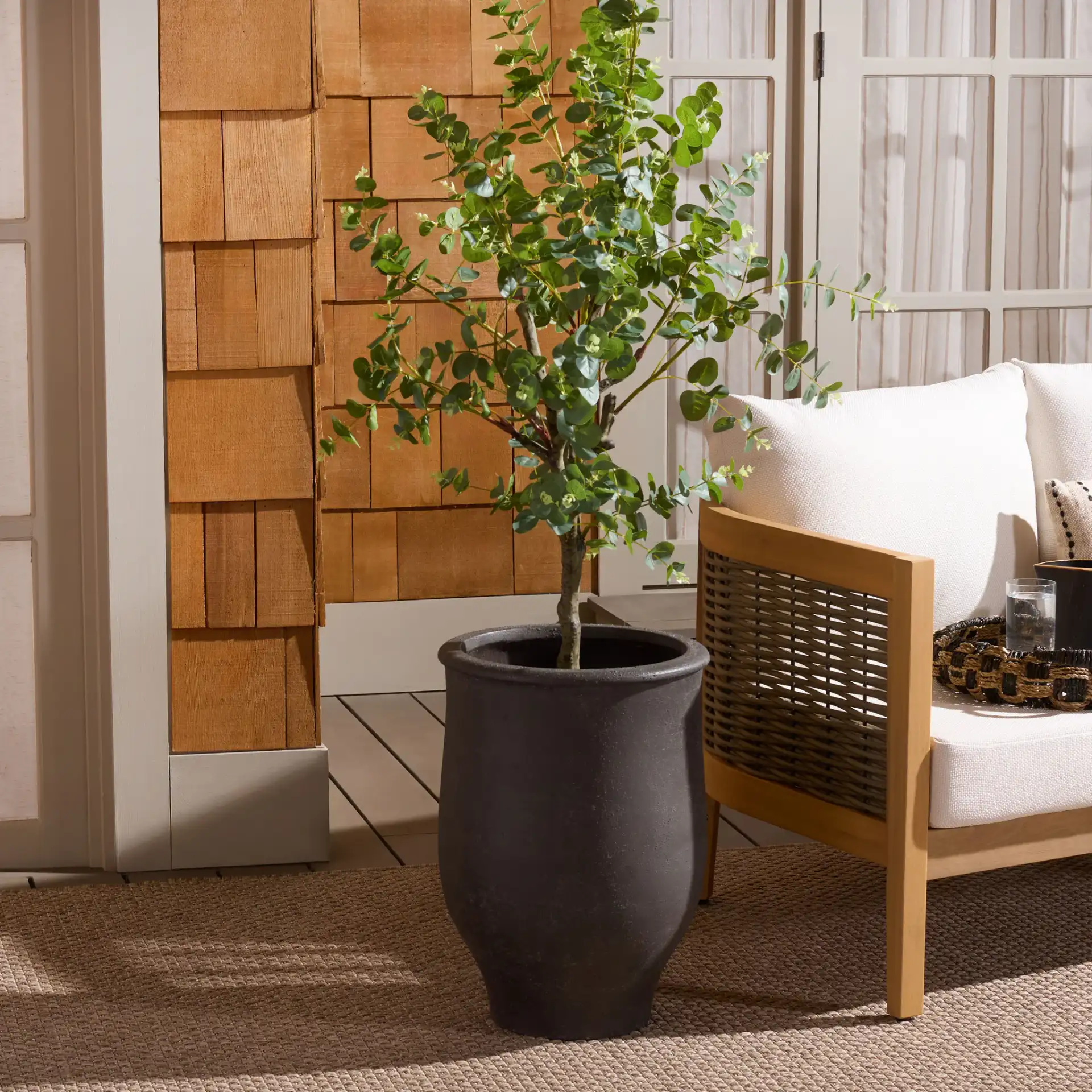 Halla Planter Pot in Charcoal in a styled room