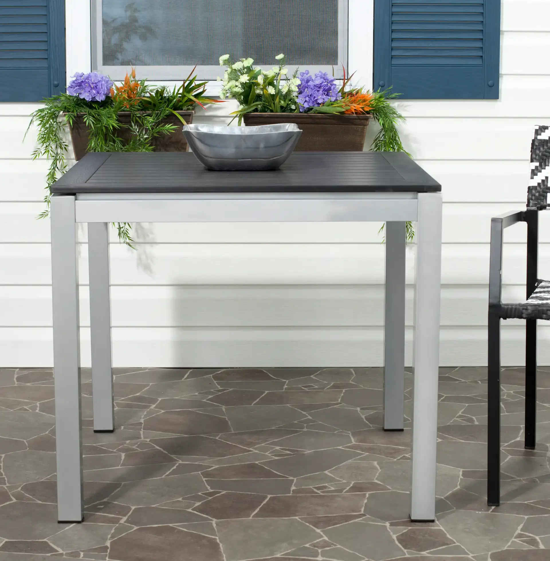 Onika Square Table in Black in a styled room