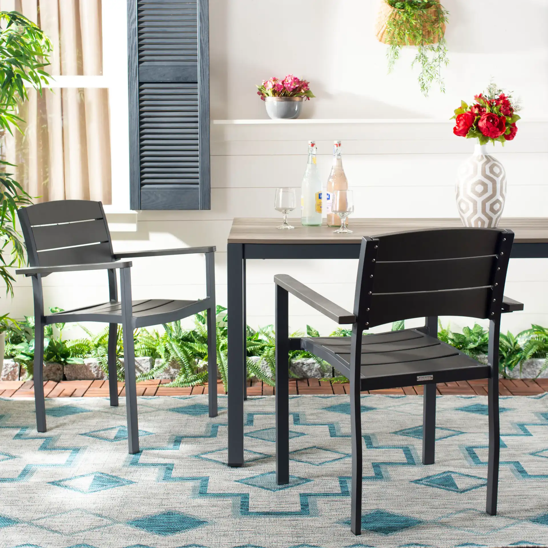 Gerhardt Stackable Chair (Set of 2) in Gray in a styled room
