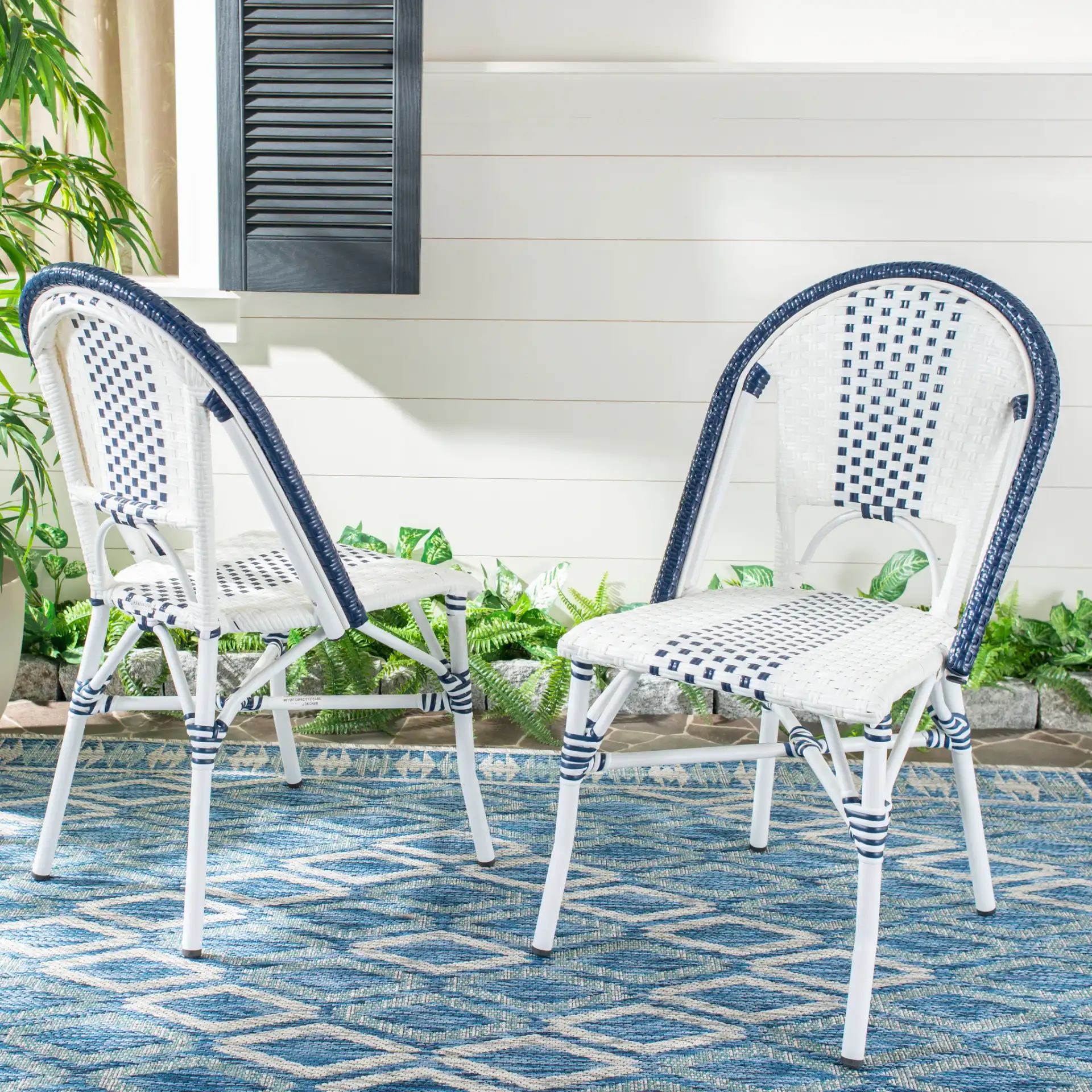 Zoya Chair (Set of 2) in Navy Blue / White in a styled room