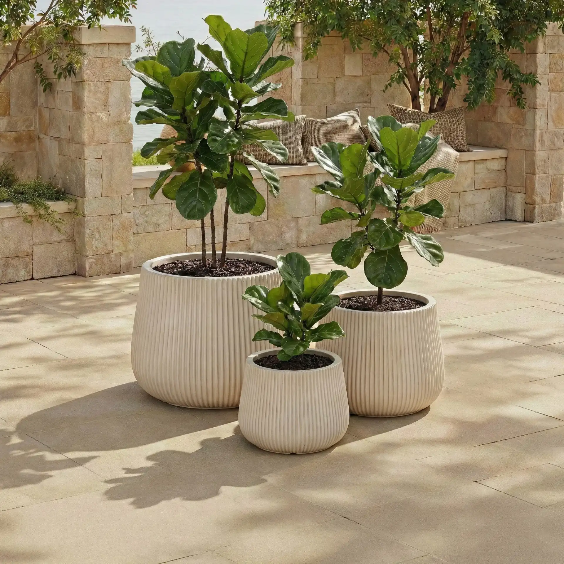 Sara Three-Piece Planter Pot Set in Beige in a styled room