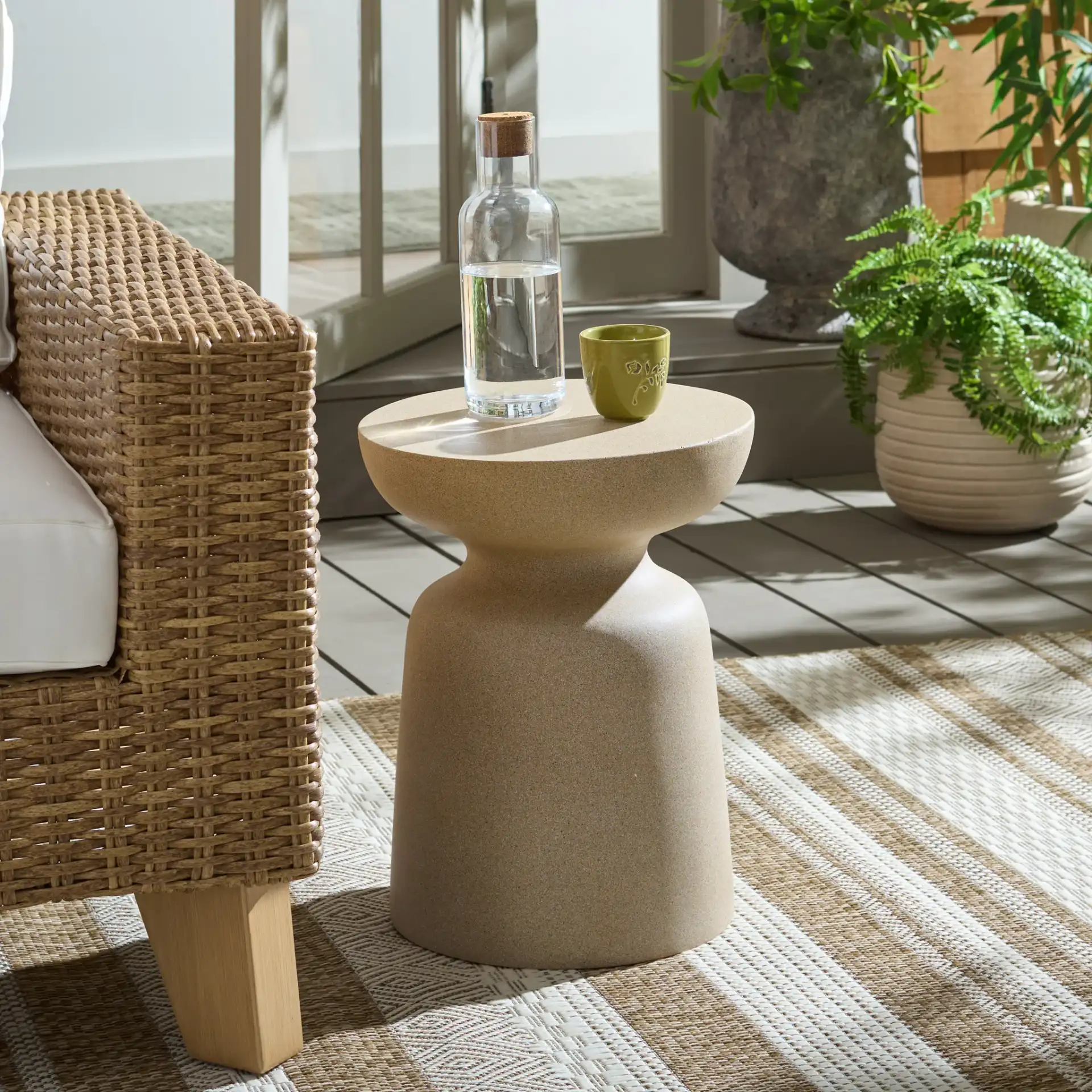 Tina Mushroom Accent Table in Beige in a styled room
