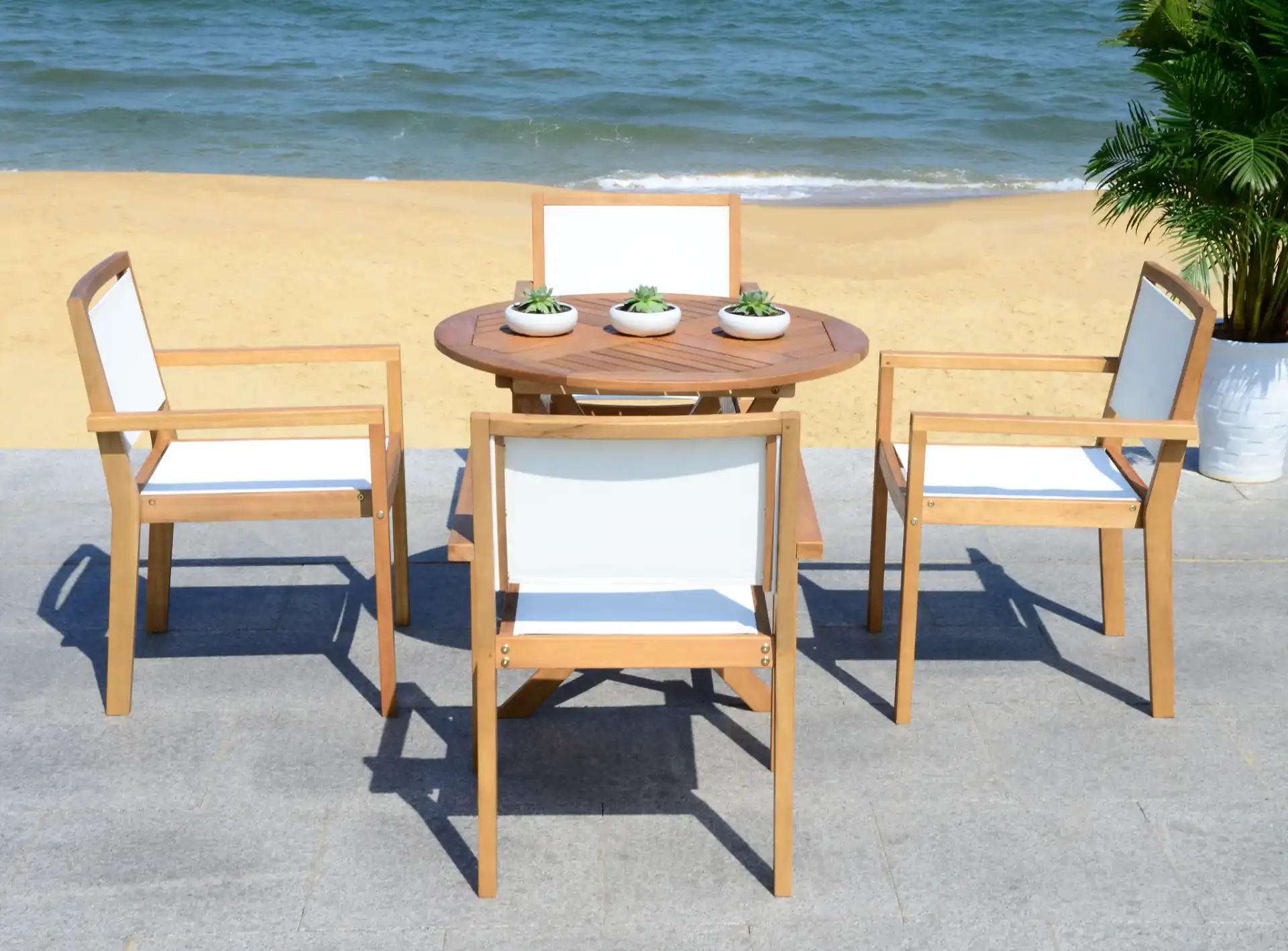Chante Round Table Five-Piece Set in Natural in a styled room