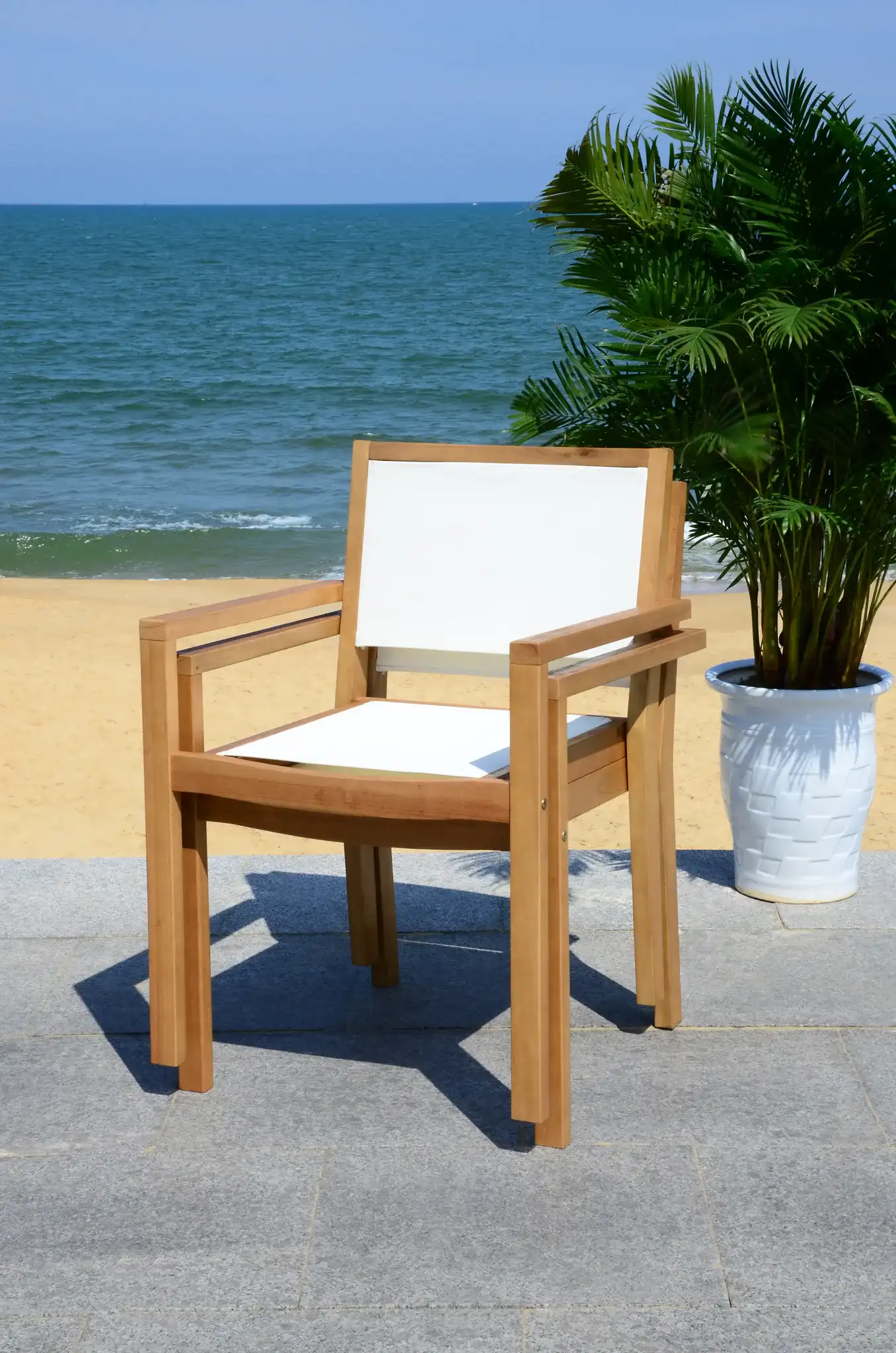 Chante Round Table Five-Piece Set in Natural in a styled room