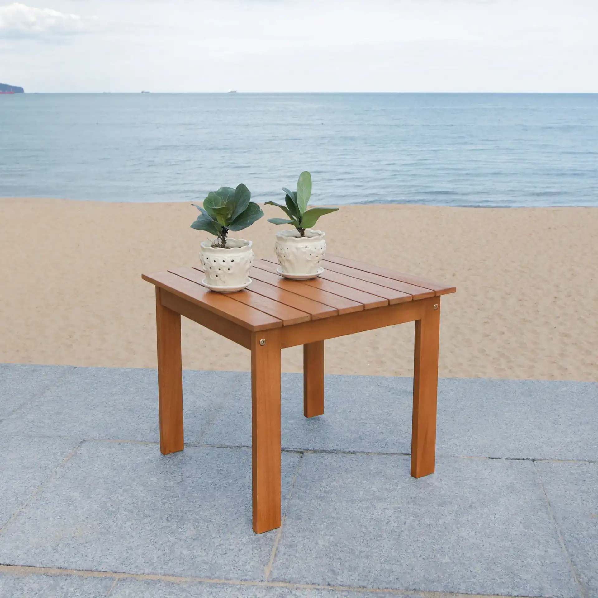 Randor Folding Table in Natural in a styled room