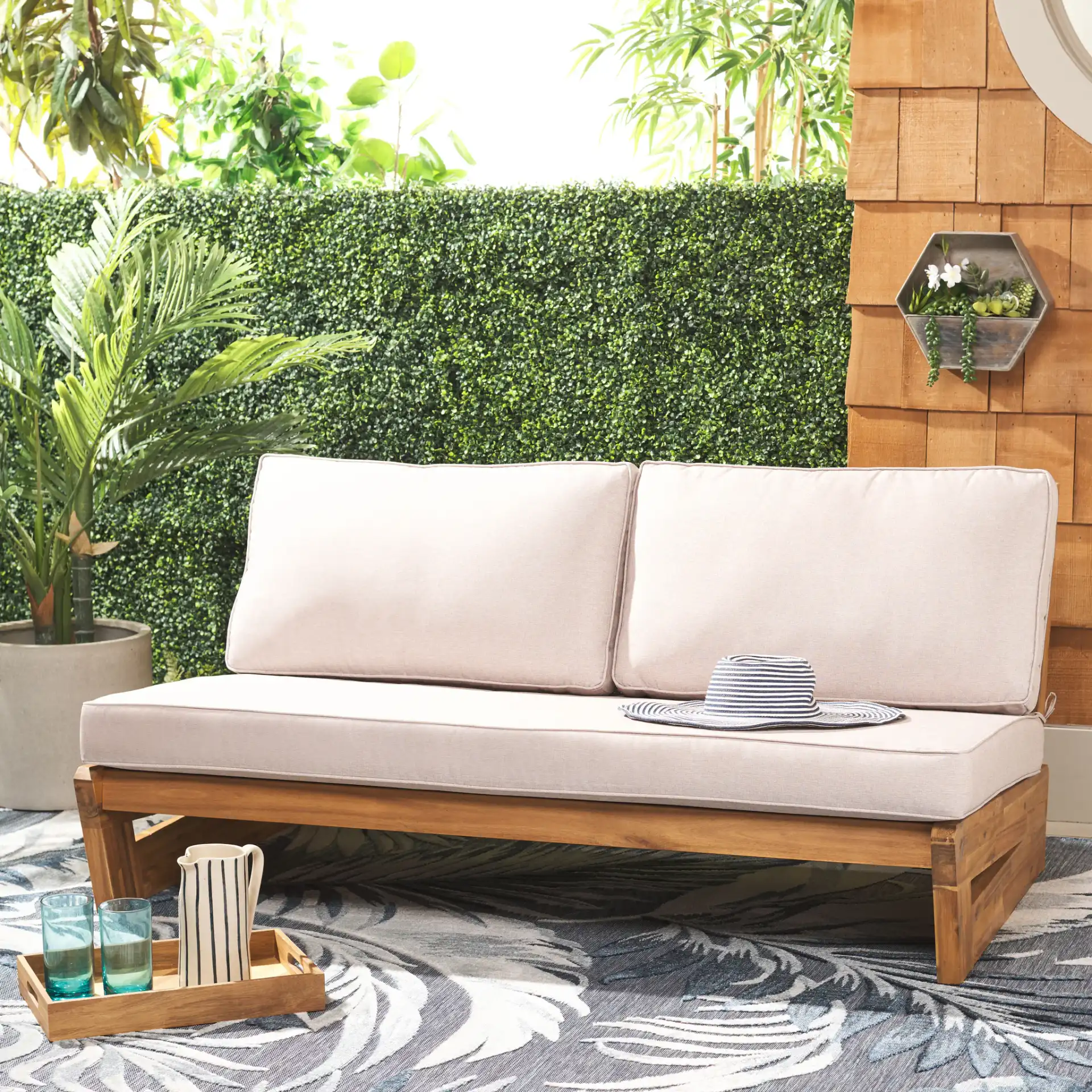 Chester Two-Seater Sofa in Natural / Light Gray in a styled room