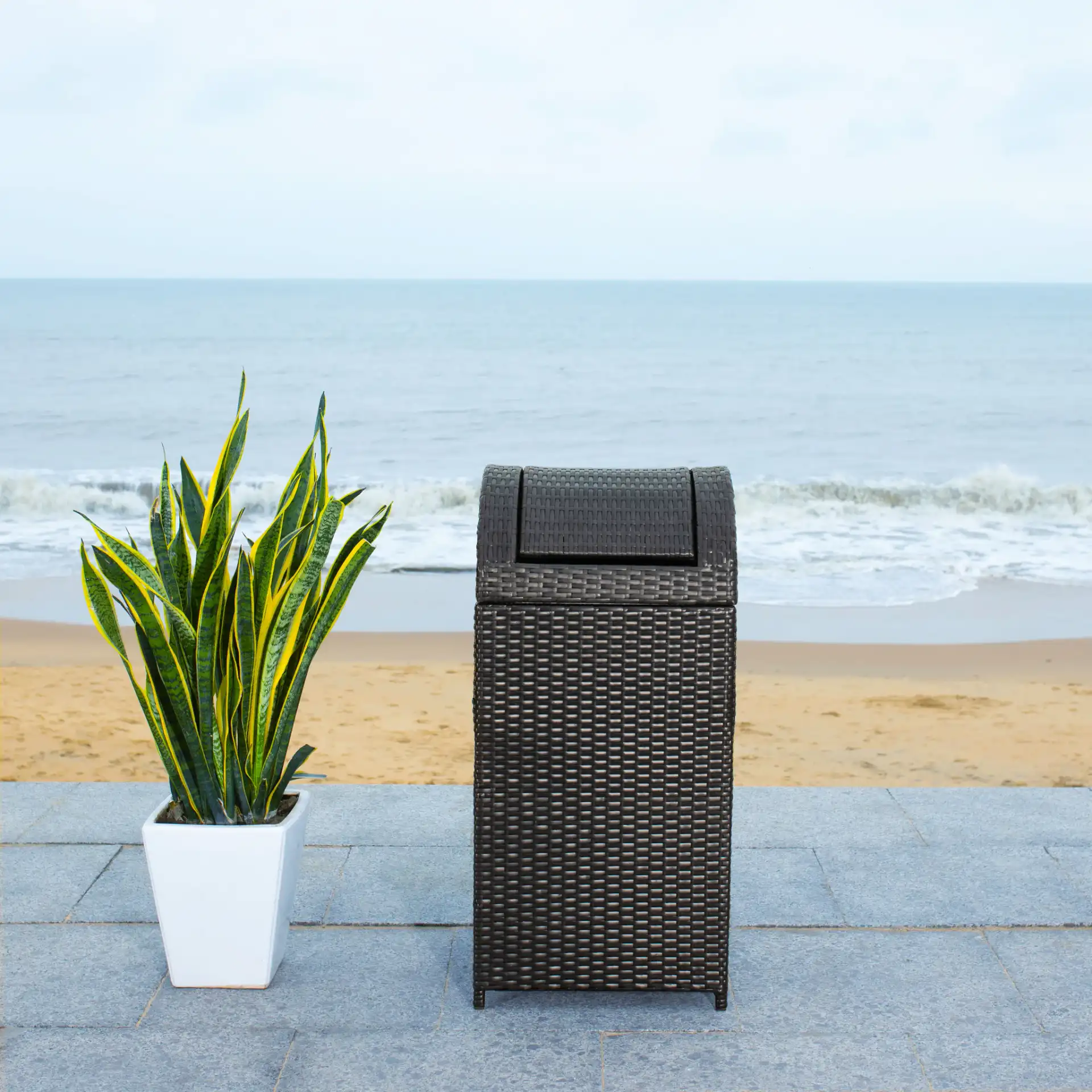 Serapis Trash Bin in Black in a styled room