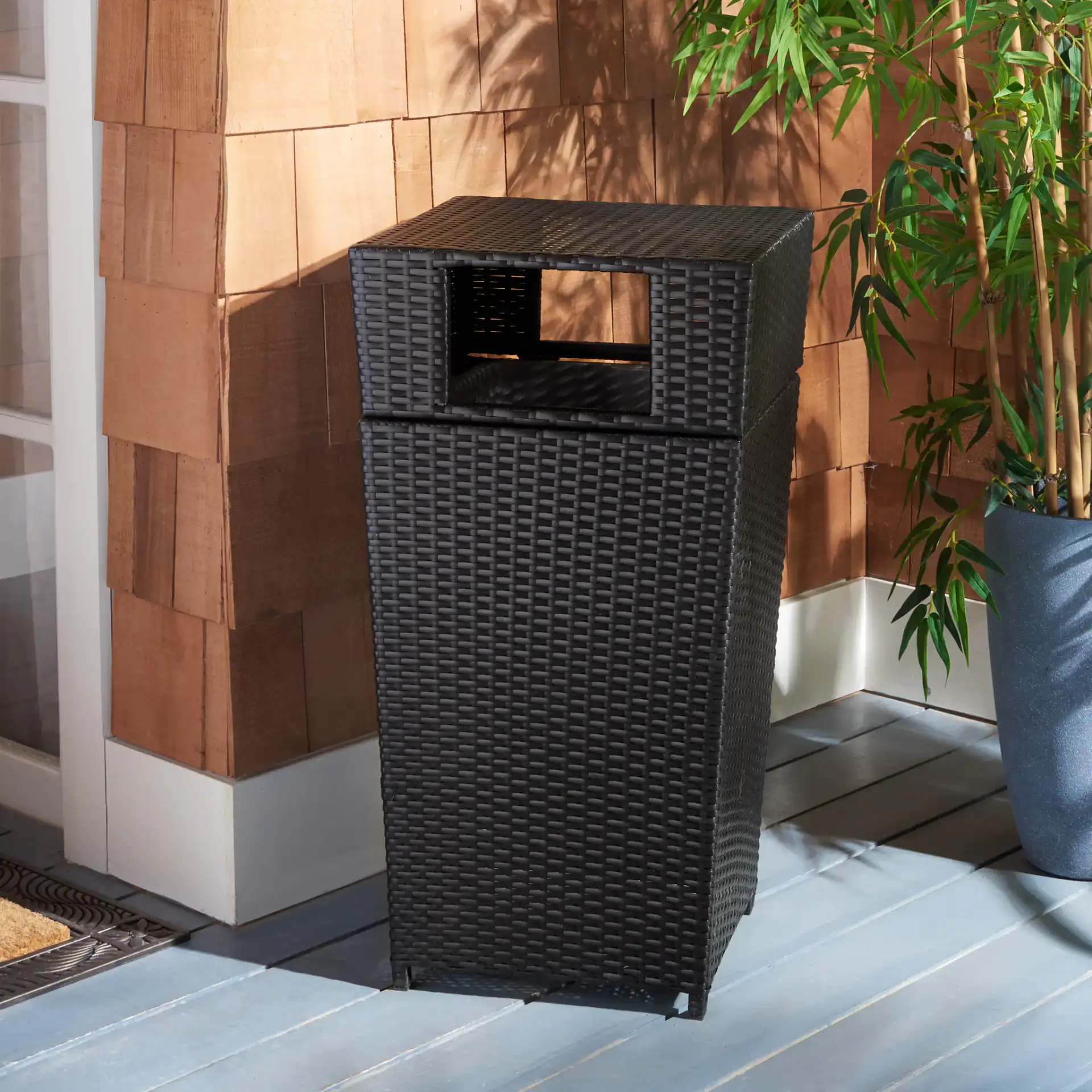 Mazeli Trash Bin in Black in a styled room