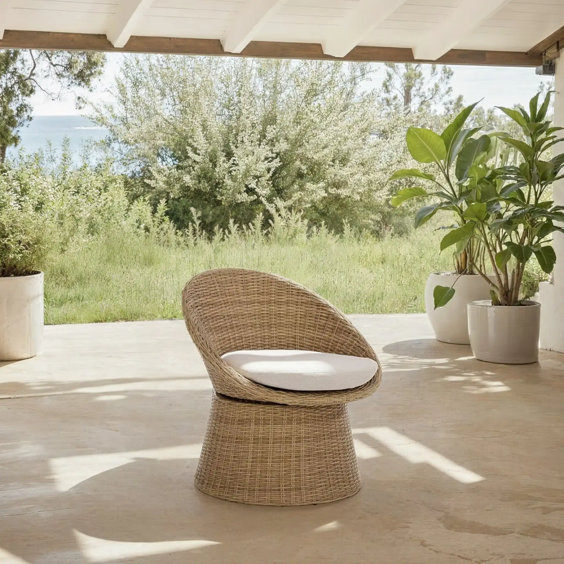 Drew Swivel Chair in Natural / Taupe in a styled room