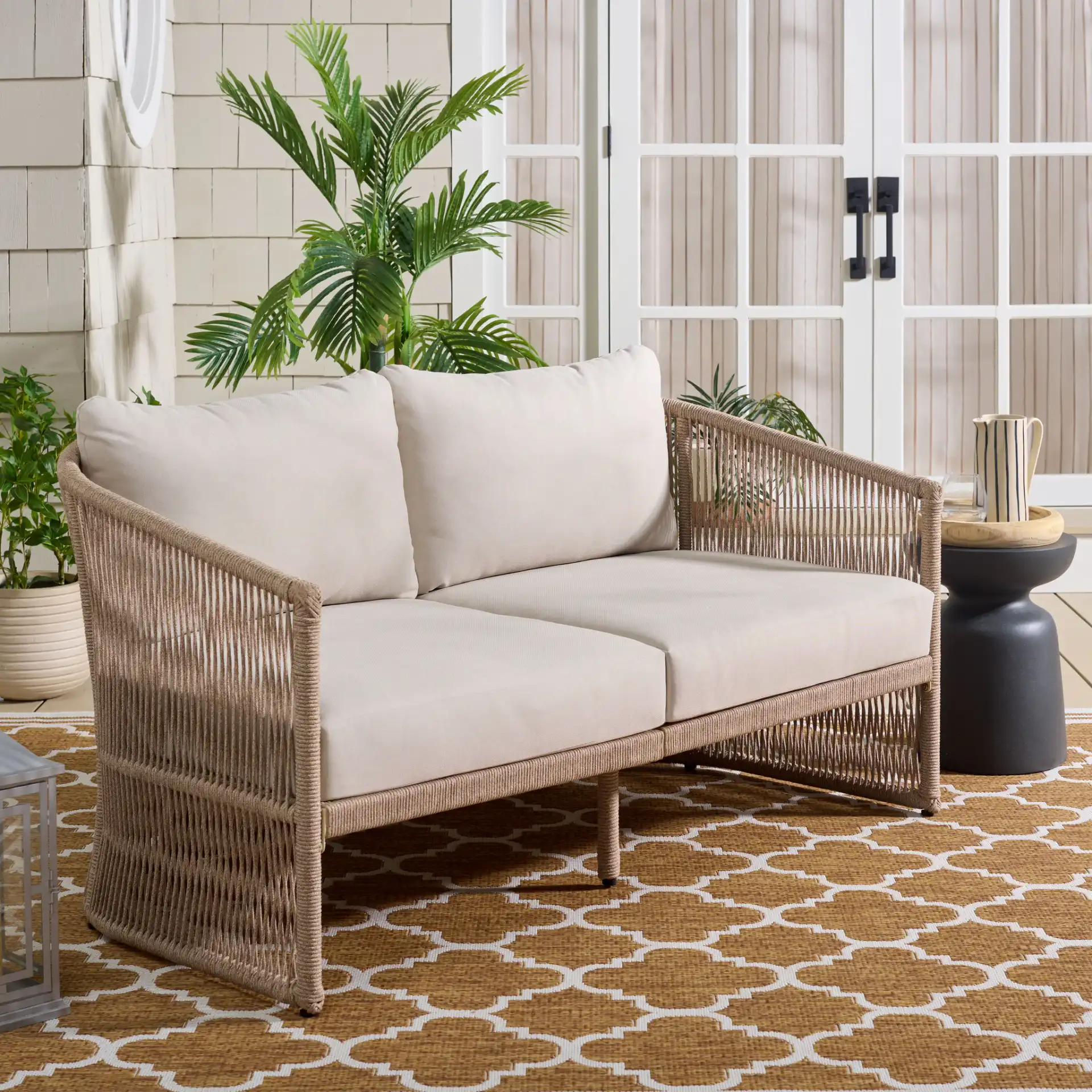 Gillian Loveseat in Heather Tan / Ivory in a styled room