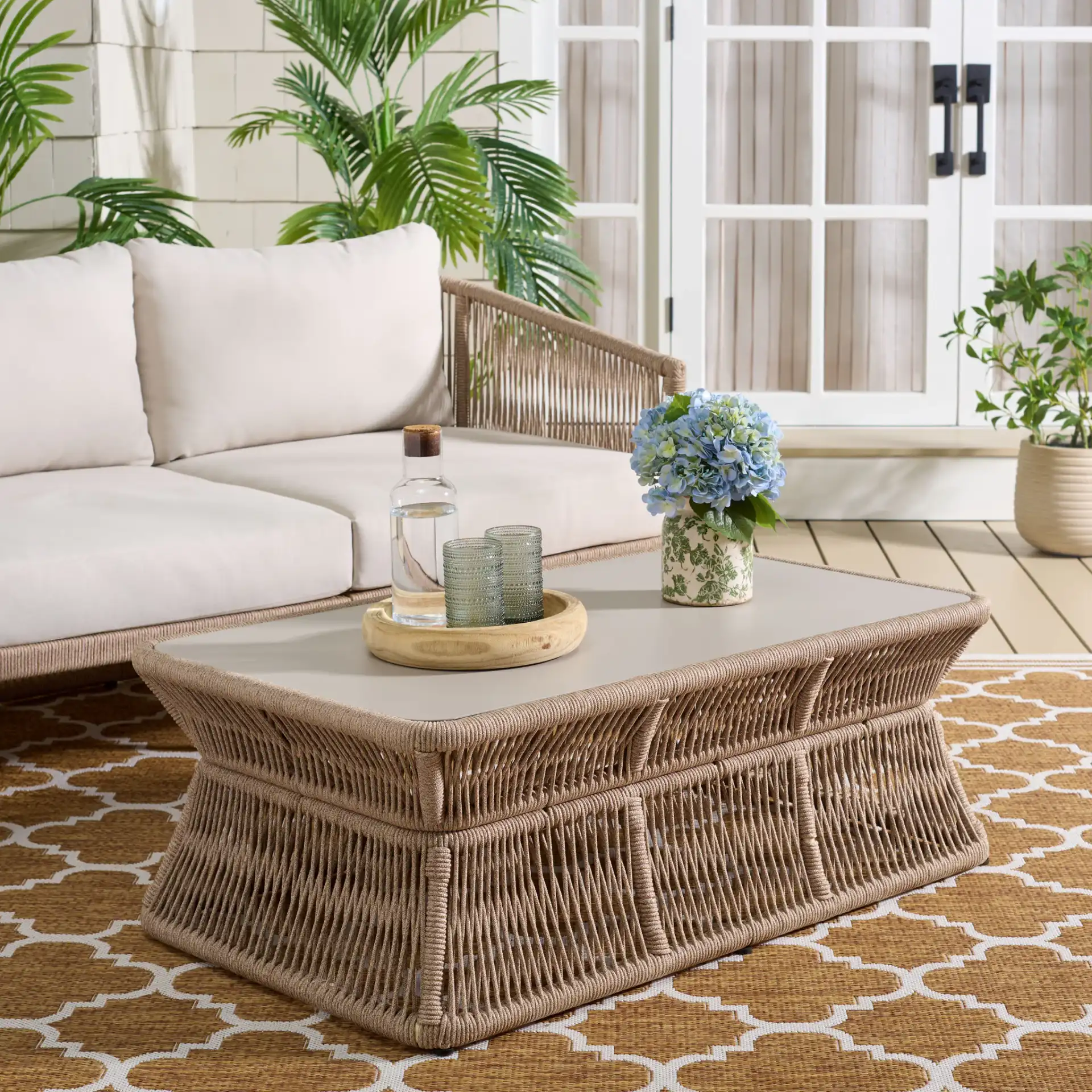 Gillian Rectangle Coffee Table in Heather Tan / Ivory in a styled room