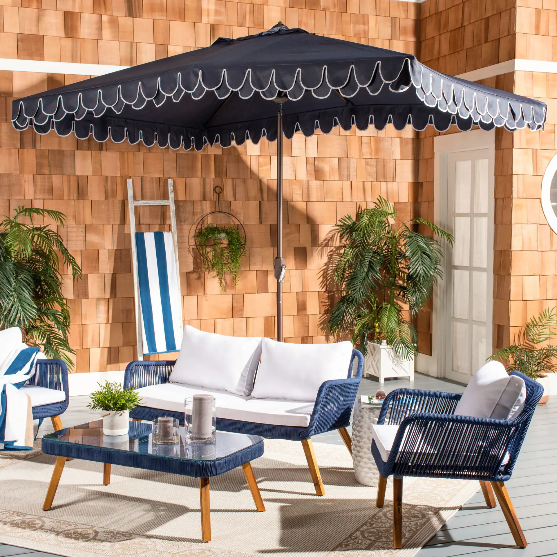 Valance 6.5X10-Foot Rectangular Umbrella in Navy Blue / White in a styled room