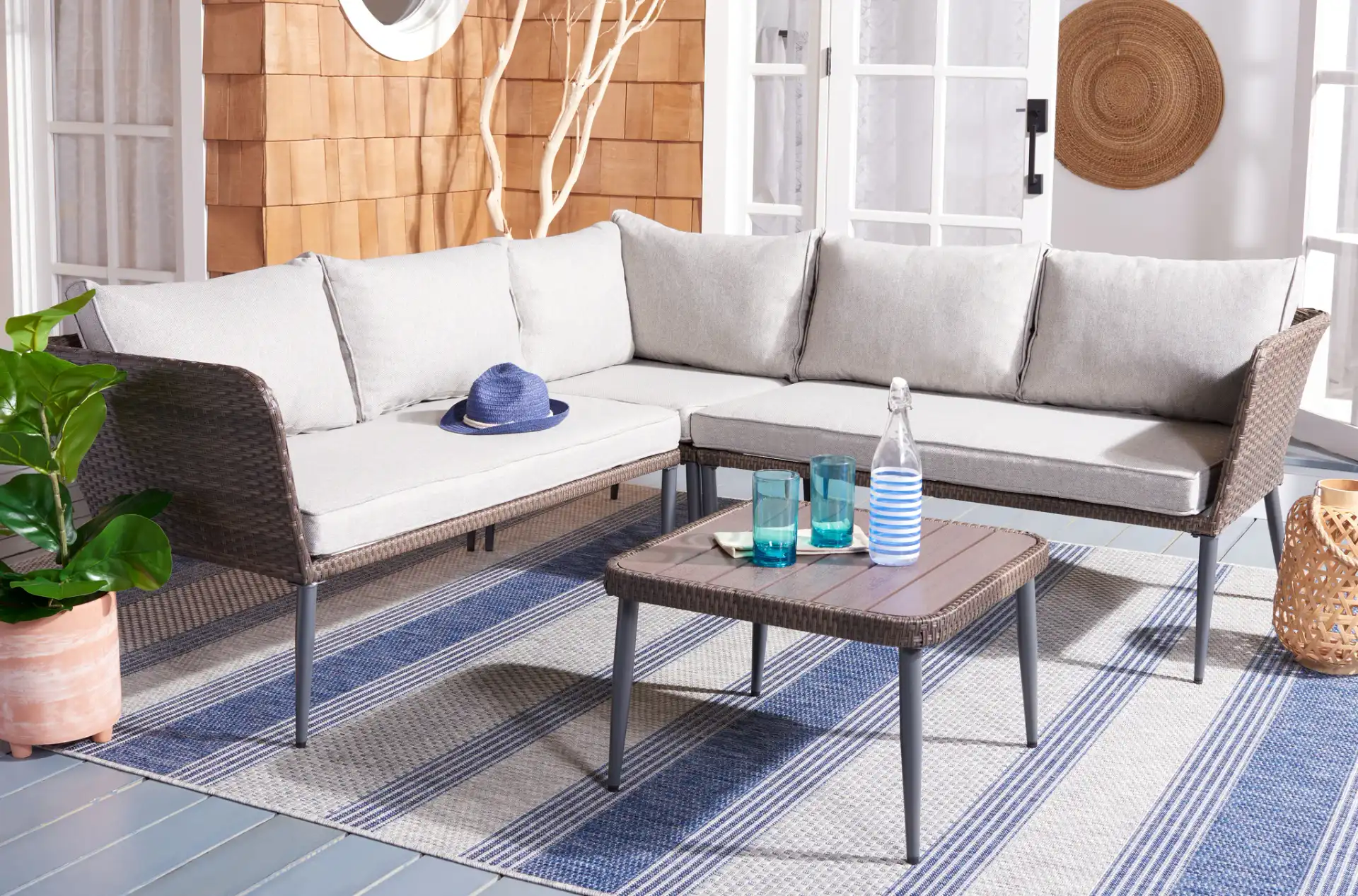 Serson Four-Piece Sofa Set in Black / Beige in a styled room