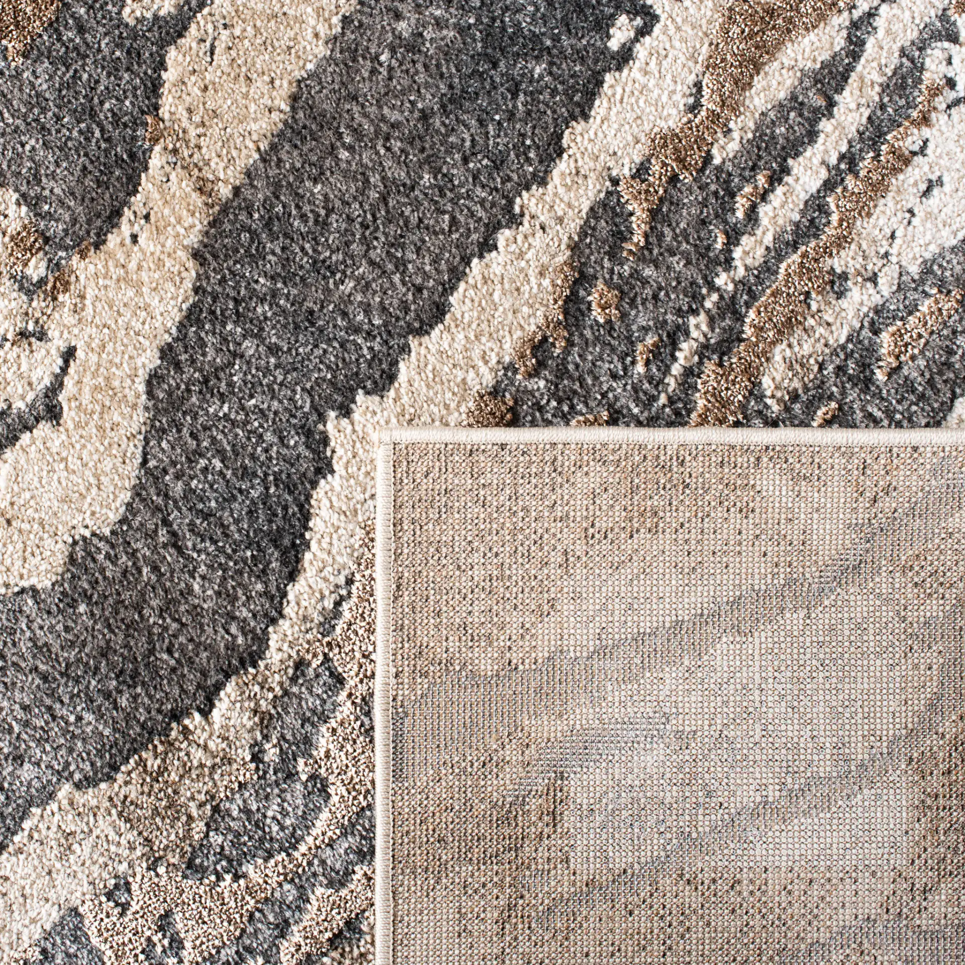 Pacific Marble Rug in Dark Gray / Beige in a styled room